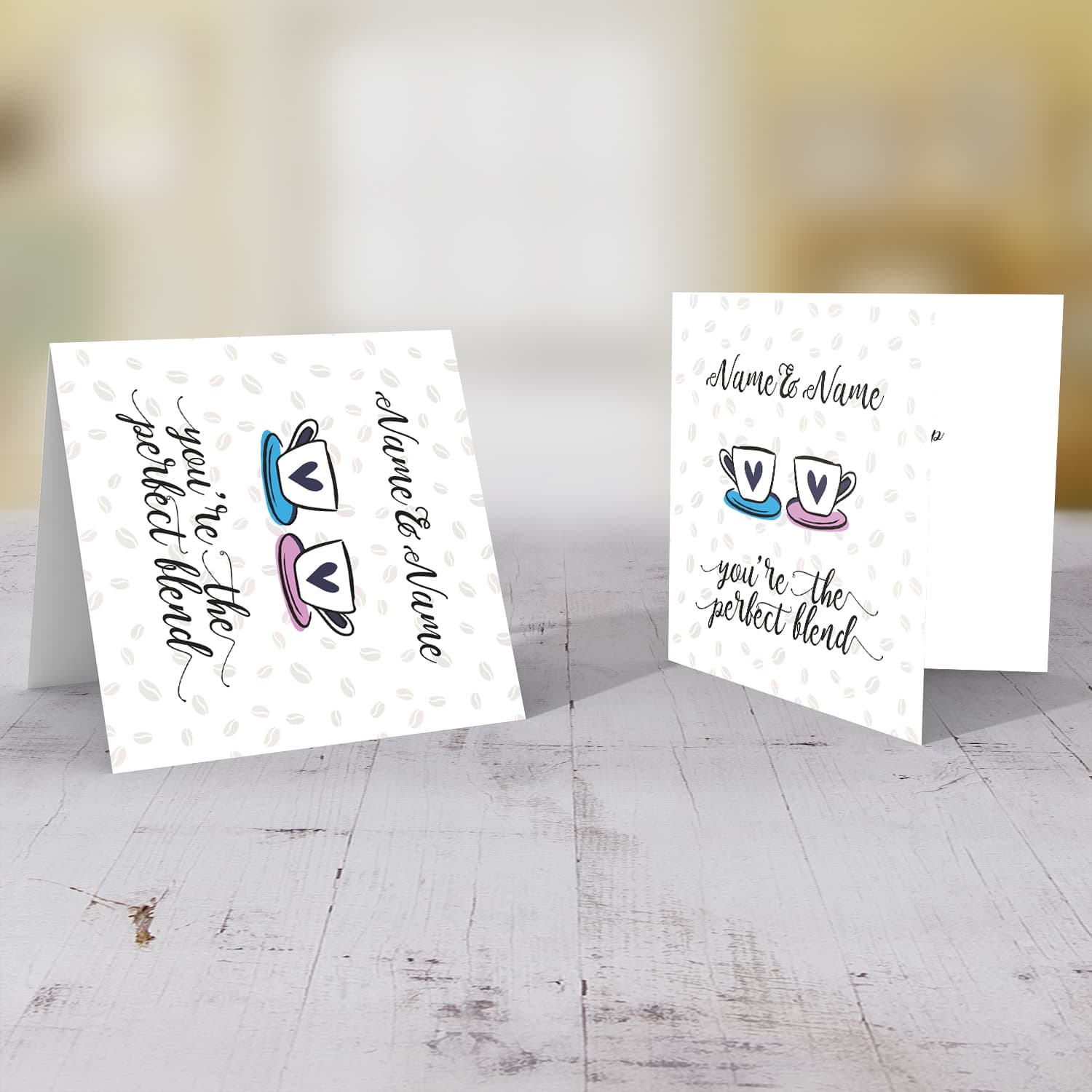 Cup themed personalisable wedding / engagement card with scattered coffee beans in the background in English 