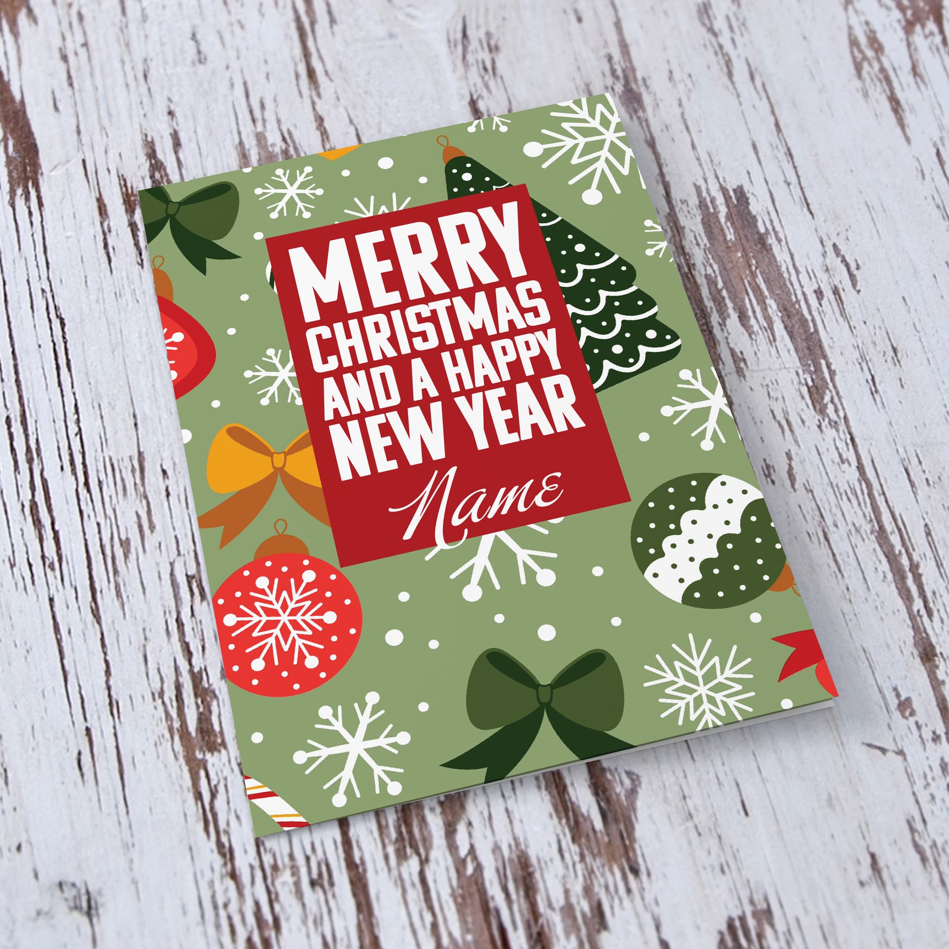 An a5 open Christmas card, featuring a Christmassy background including baubles, bows and snowflakes in English (Neutral & Personalisable)