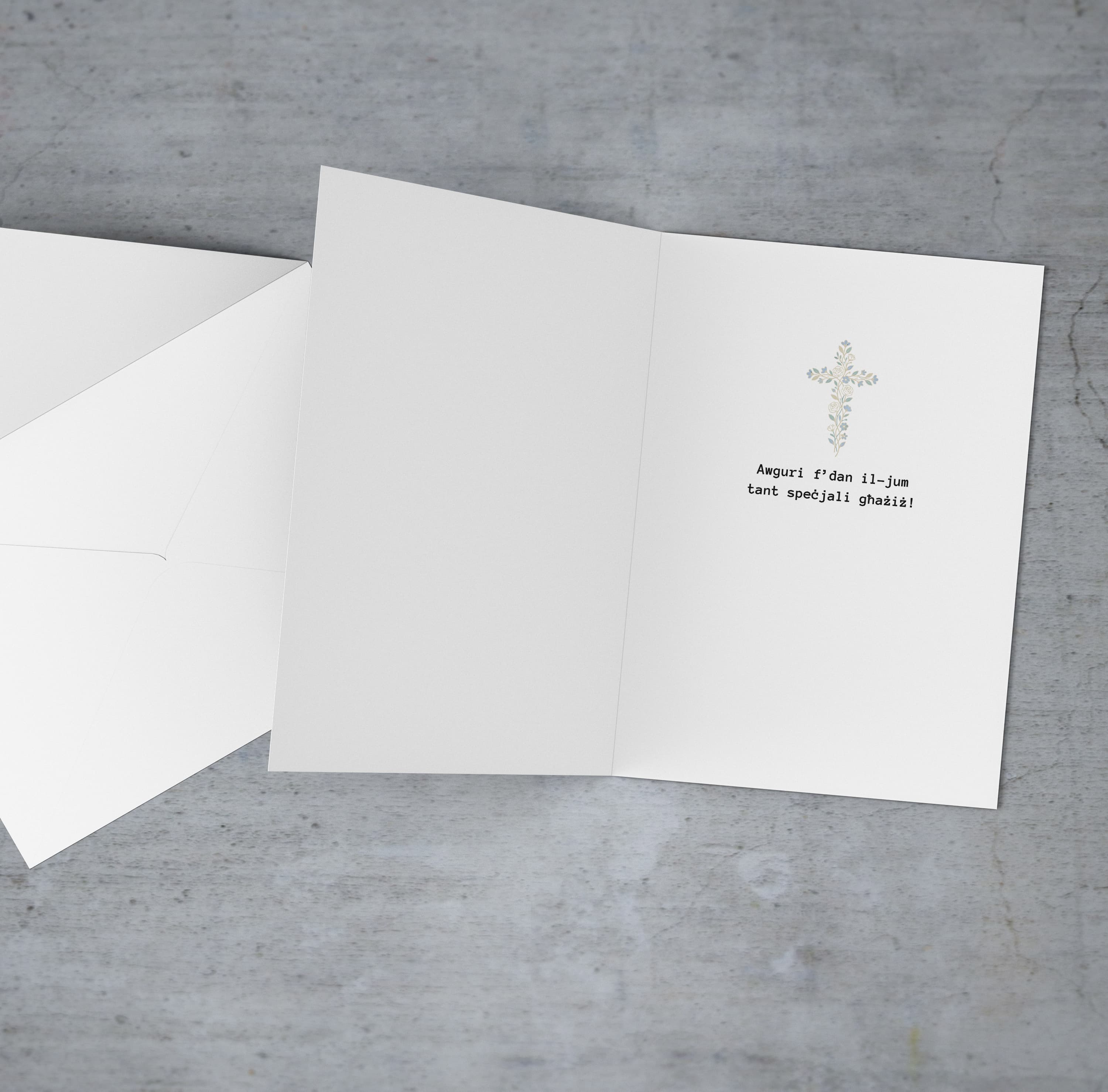 A beautiful baptism card for boys featuring a floral cross, and a background with touches of gold and light blue in Maltese (Personalisable)