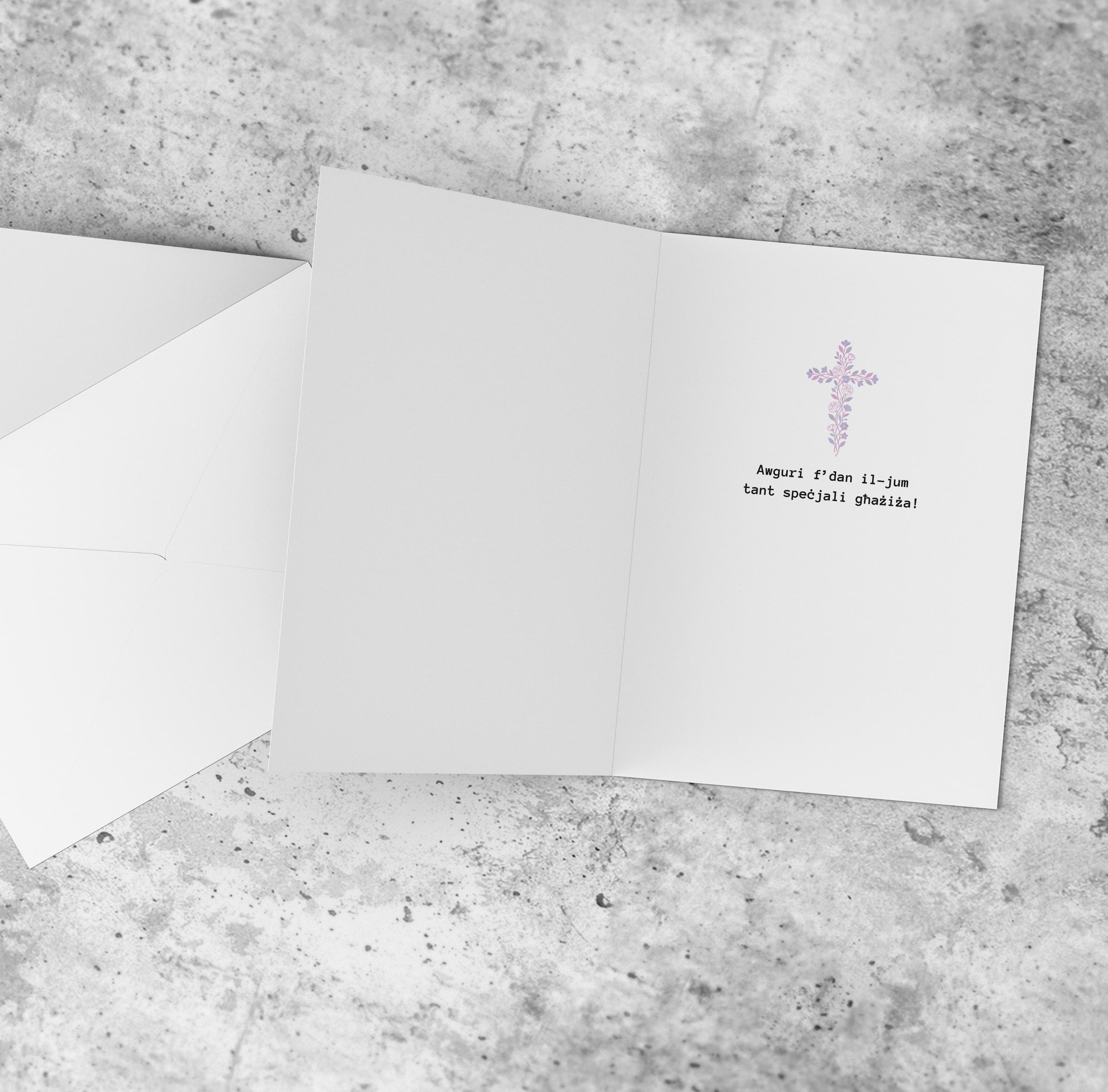 A beautiful baptism card for girls featuring a floral cross, and a background with touches of gold and pink in Maltese (Personalisable)