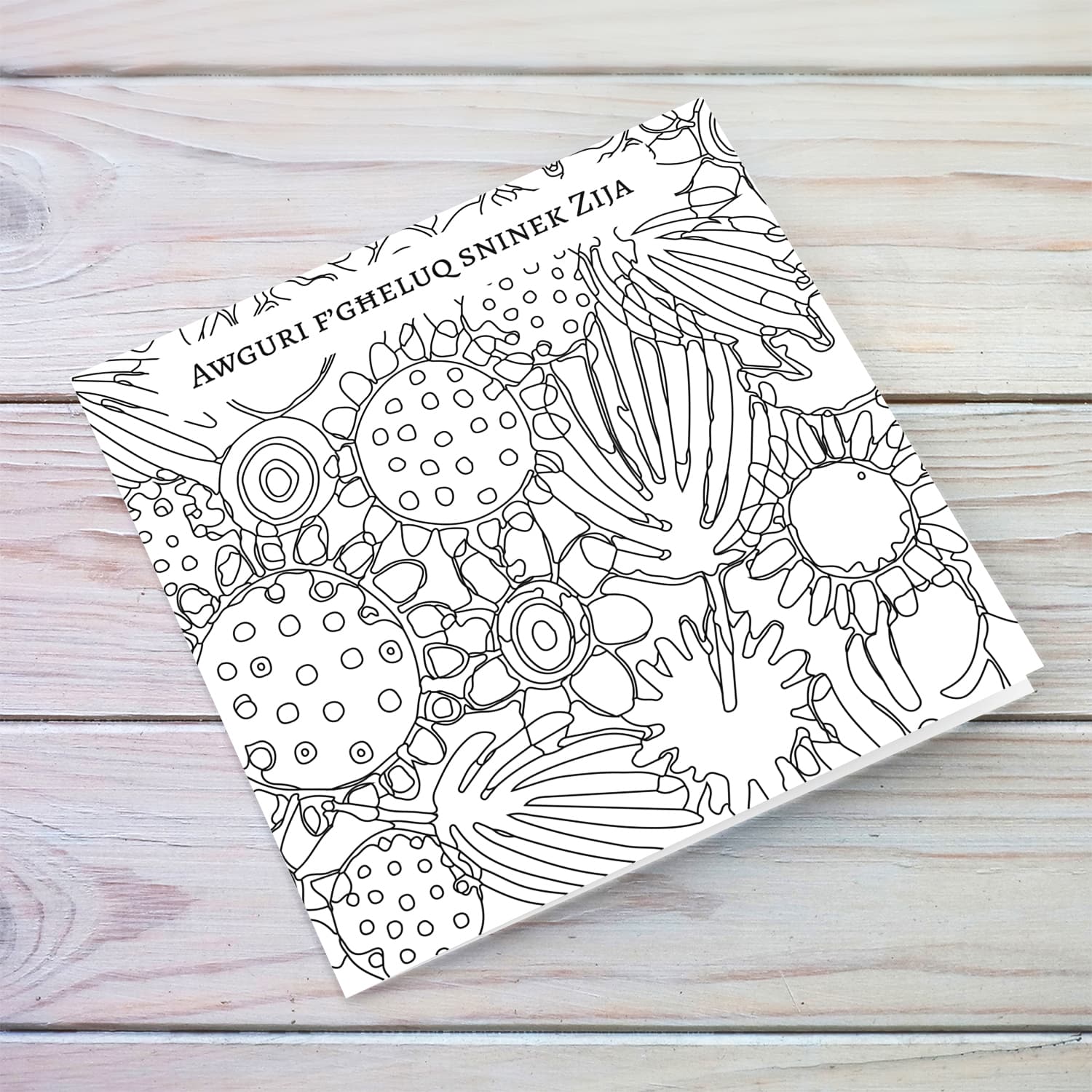 Colouring birthday card full of flowers and leaves for Aunty in Maltese