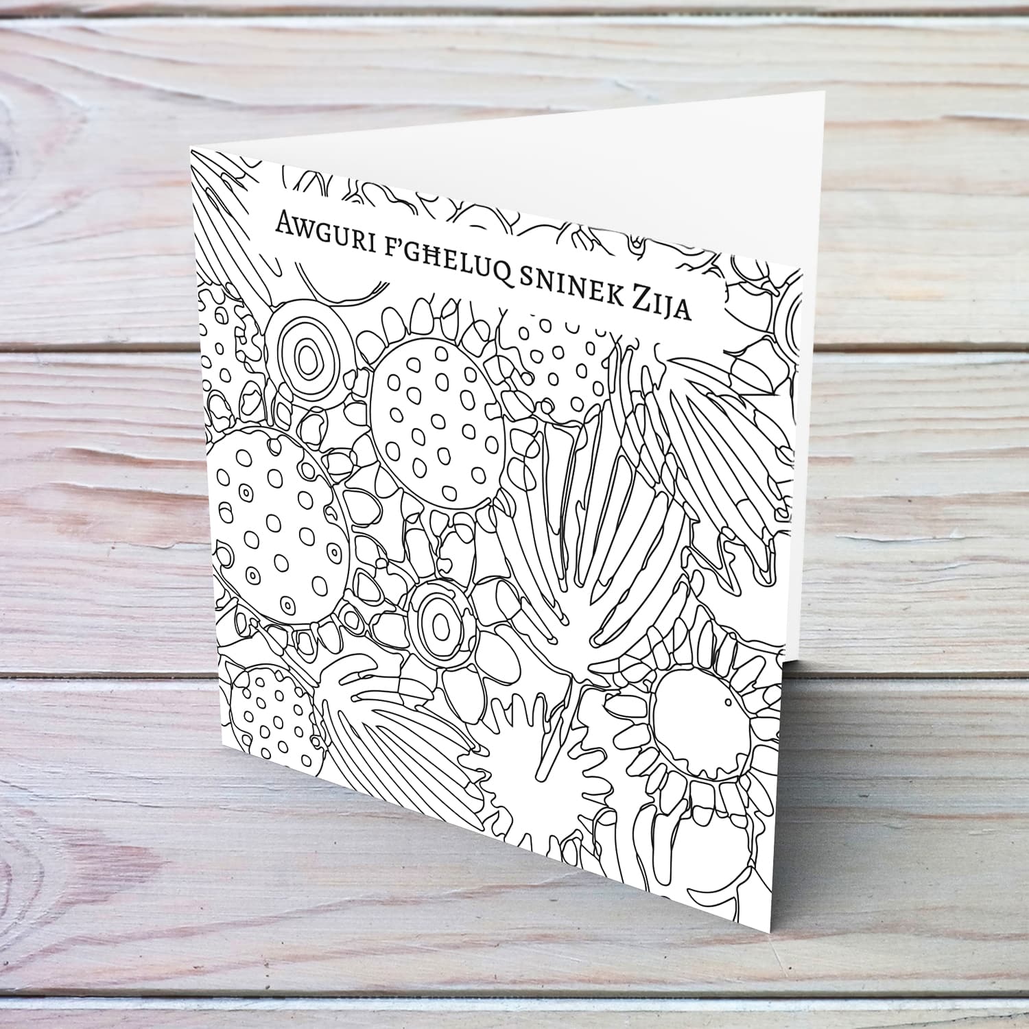 Colouring birthday card full of flowers and leaves for Aunty in Maltese