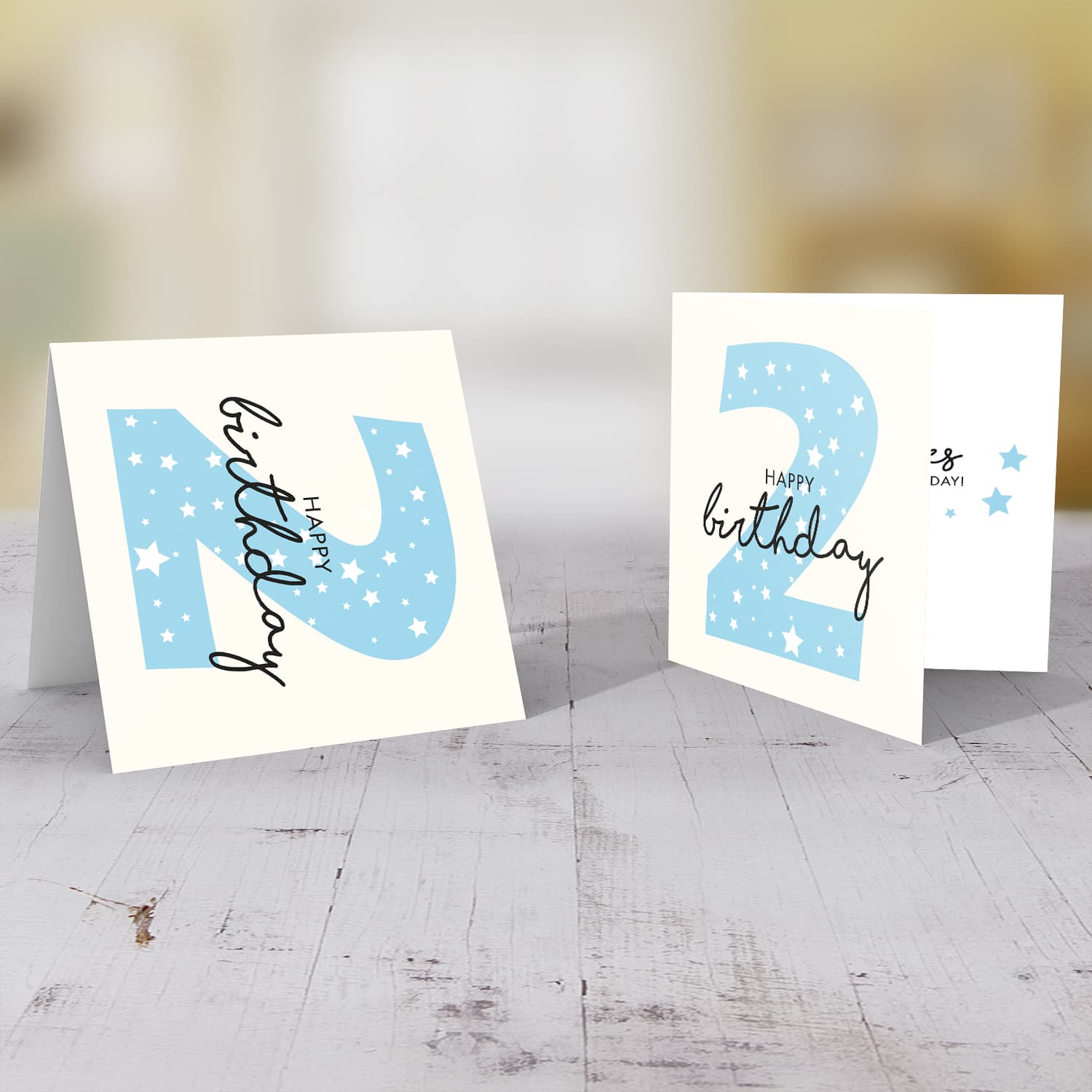 Blue number 2 with scattered white hearts birthday card in English