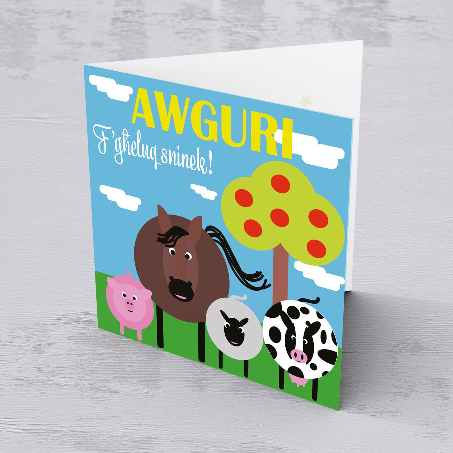 Animal themed birthday card including pig, horse, sheep and cow with apple tree in Maltese