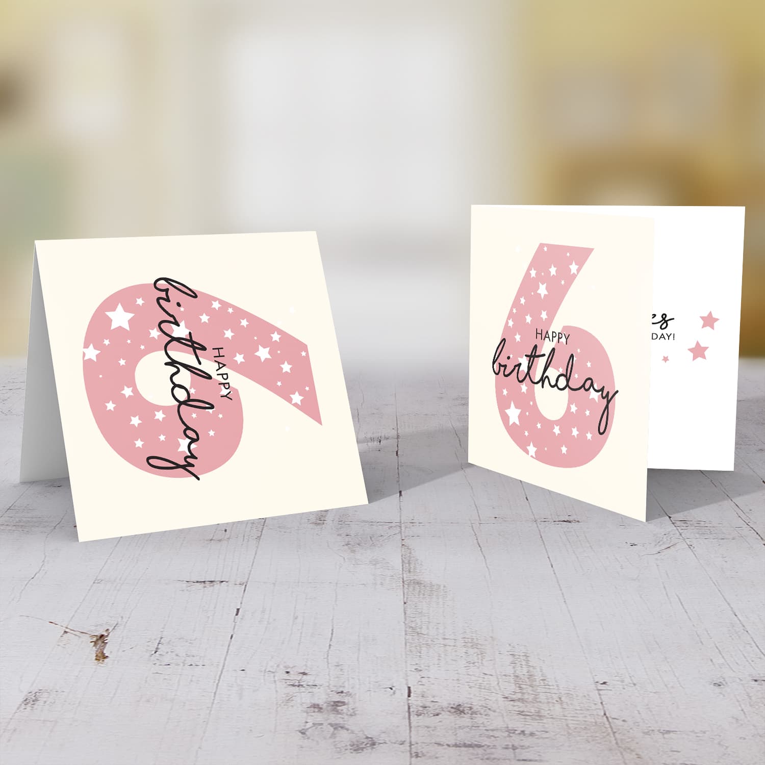 Pink number 6 with scattered white hearts birthday card in English