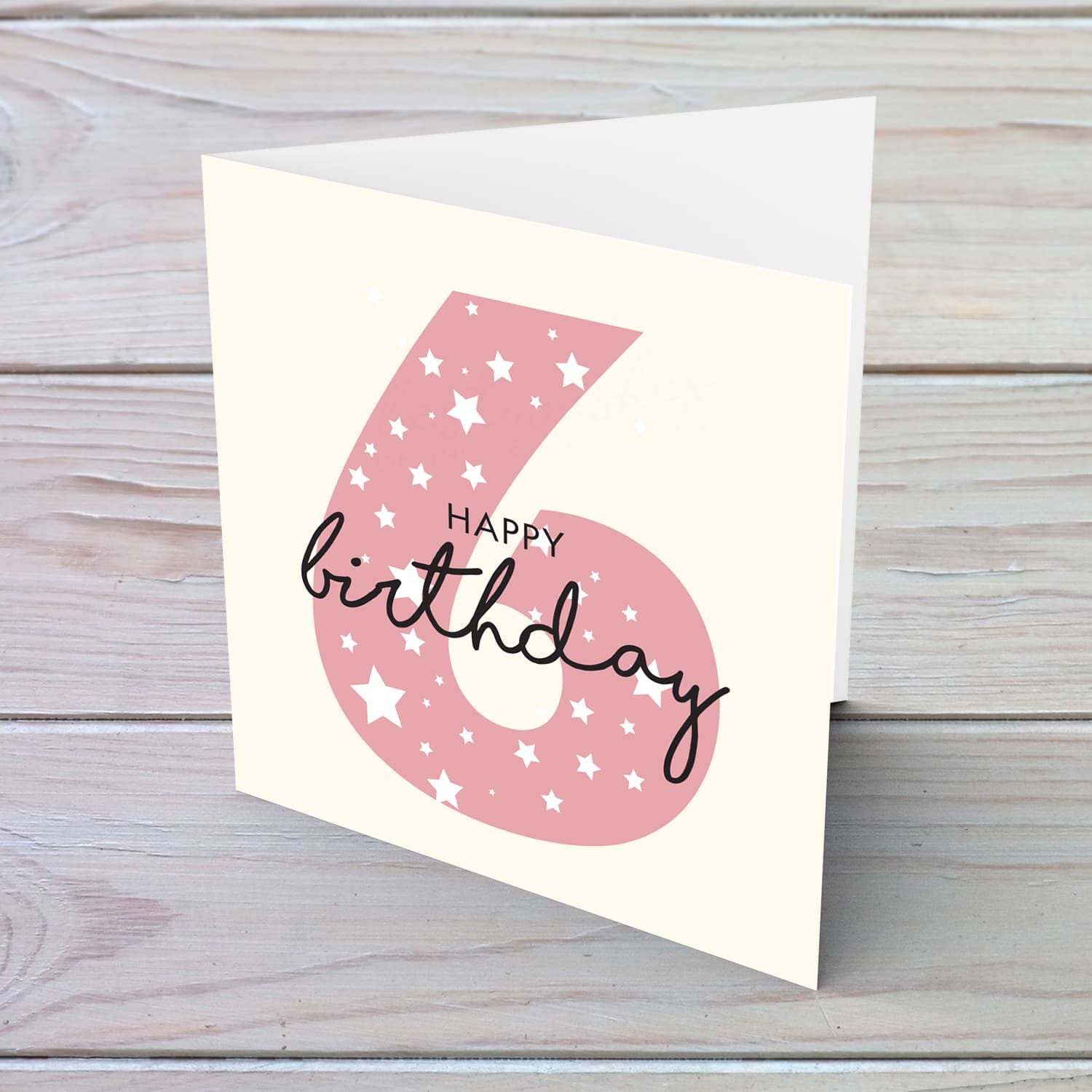 Pink number 6 with scattered white hearts birthday card in English