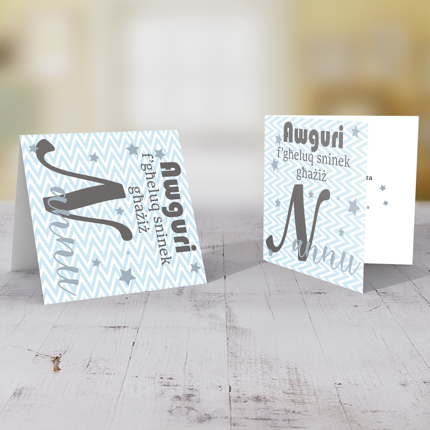 Blue with zigzag background and scattered stars birthday card for Grandpa in Maltese