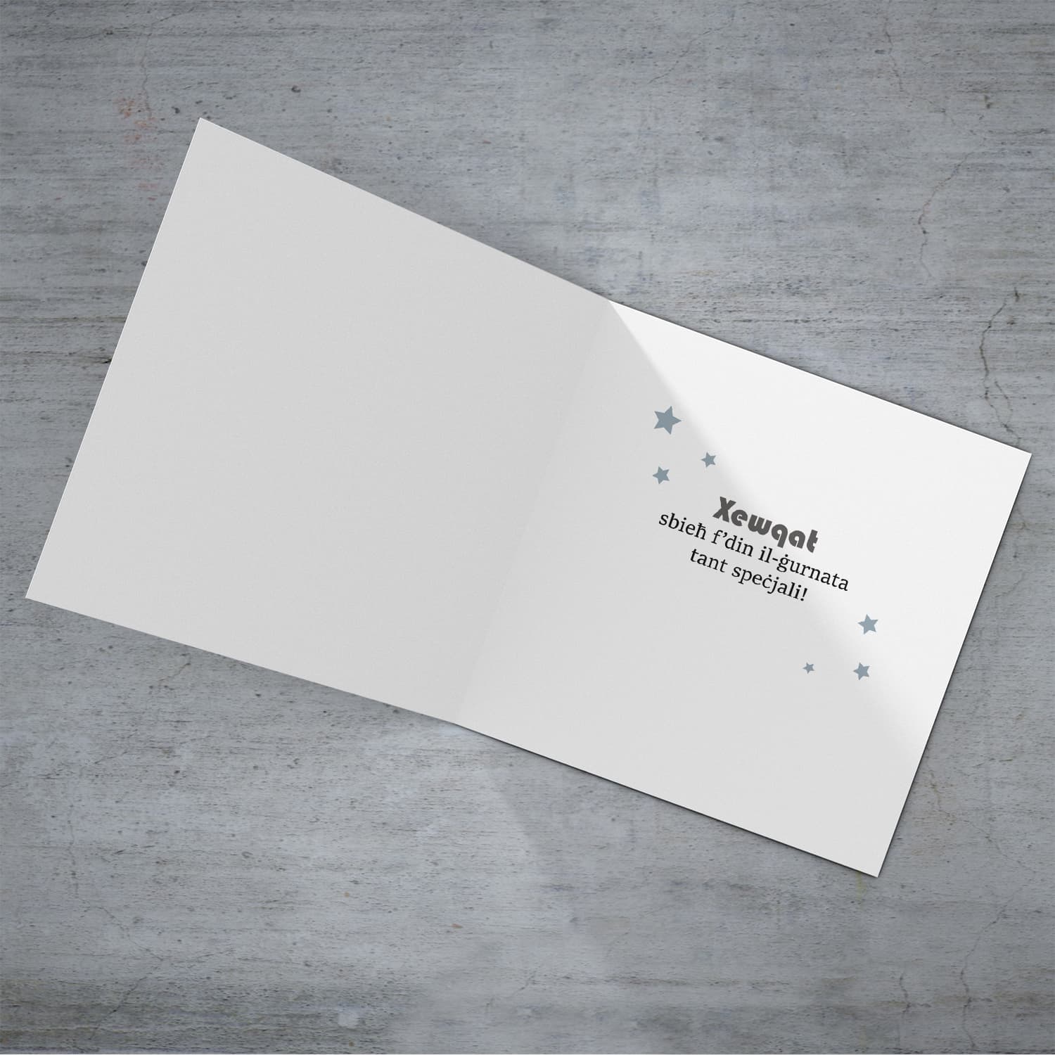 Blue with zigzag background and scattered stars birthday card for Grandpa in Maltese