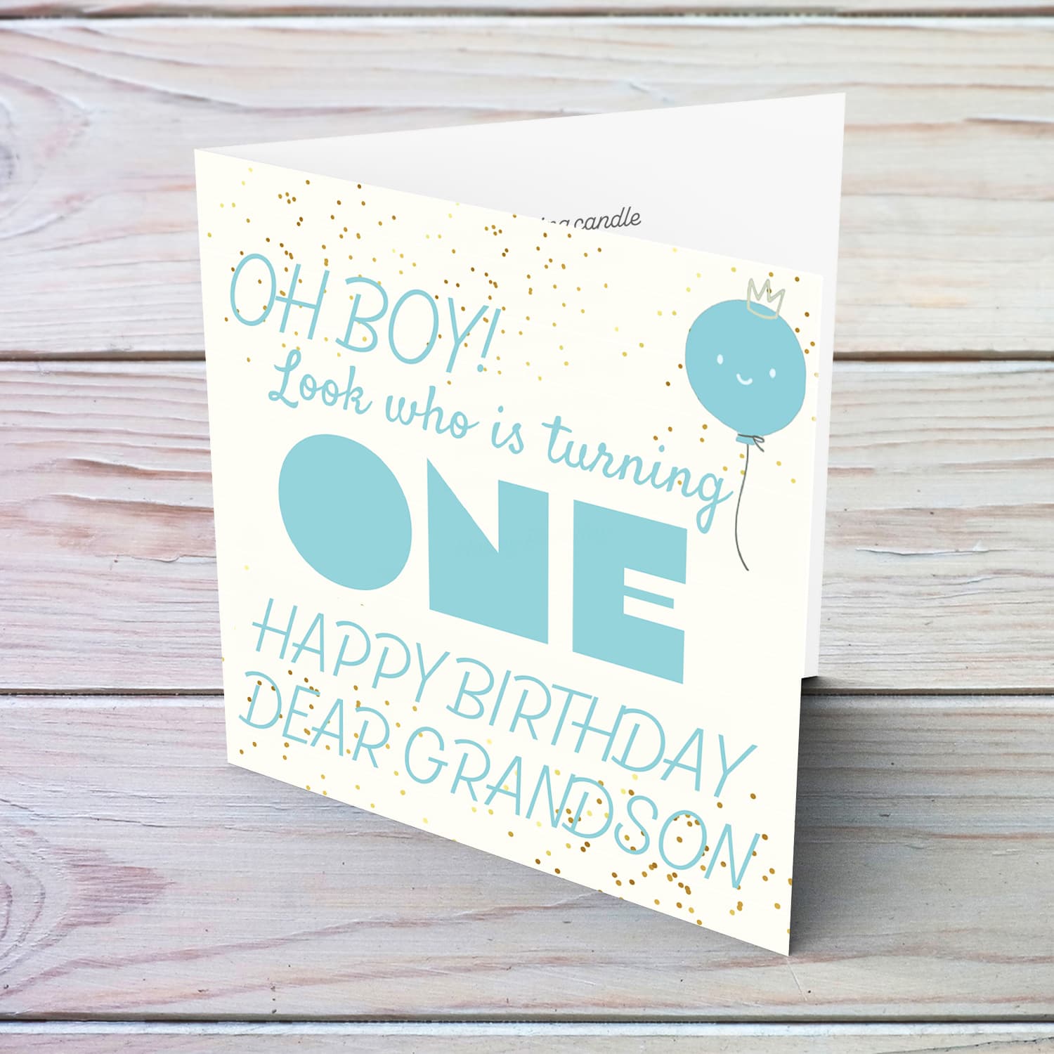 Look who's turning ONE - birthday card for a dear grandson with blue/turquoise text with cute balloon in English