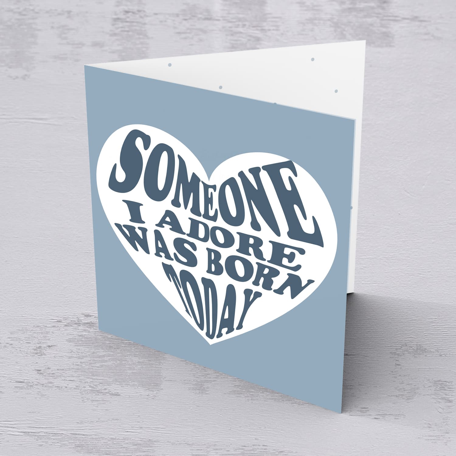 Someone I adore was born today birthday card in blue tones in English