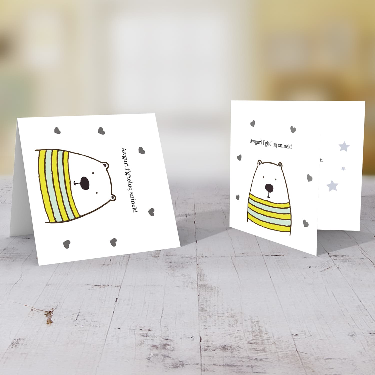 Bear themed birthday card with scattered hearts in Maltese