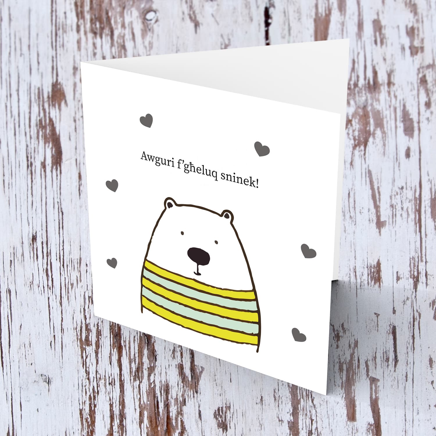 Bear themed birthday card with scattered hearts in Maltese