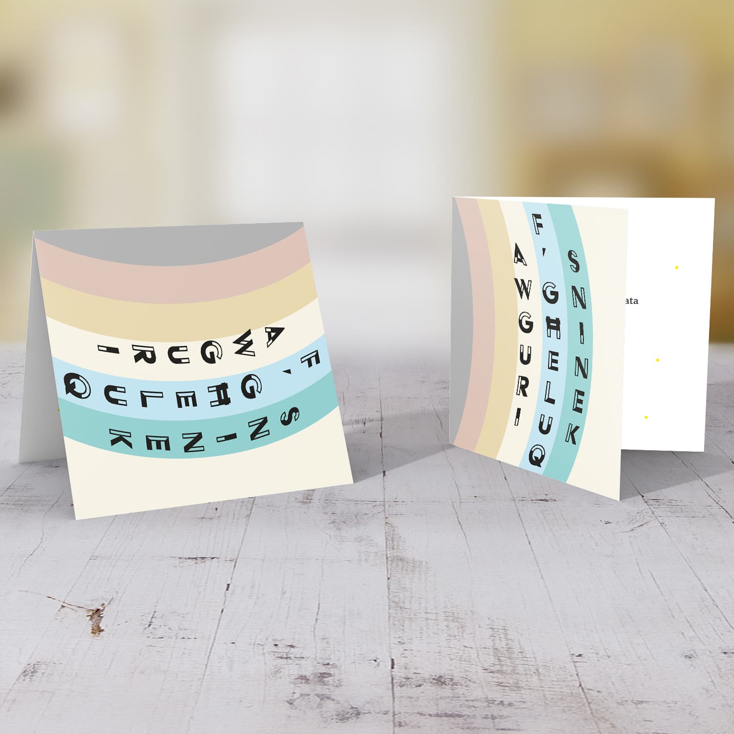 Various layers of pastel colours open birthday card in Maltese