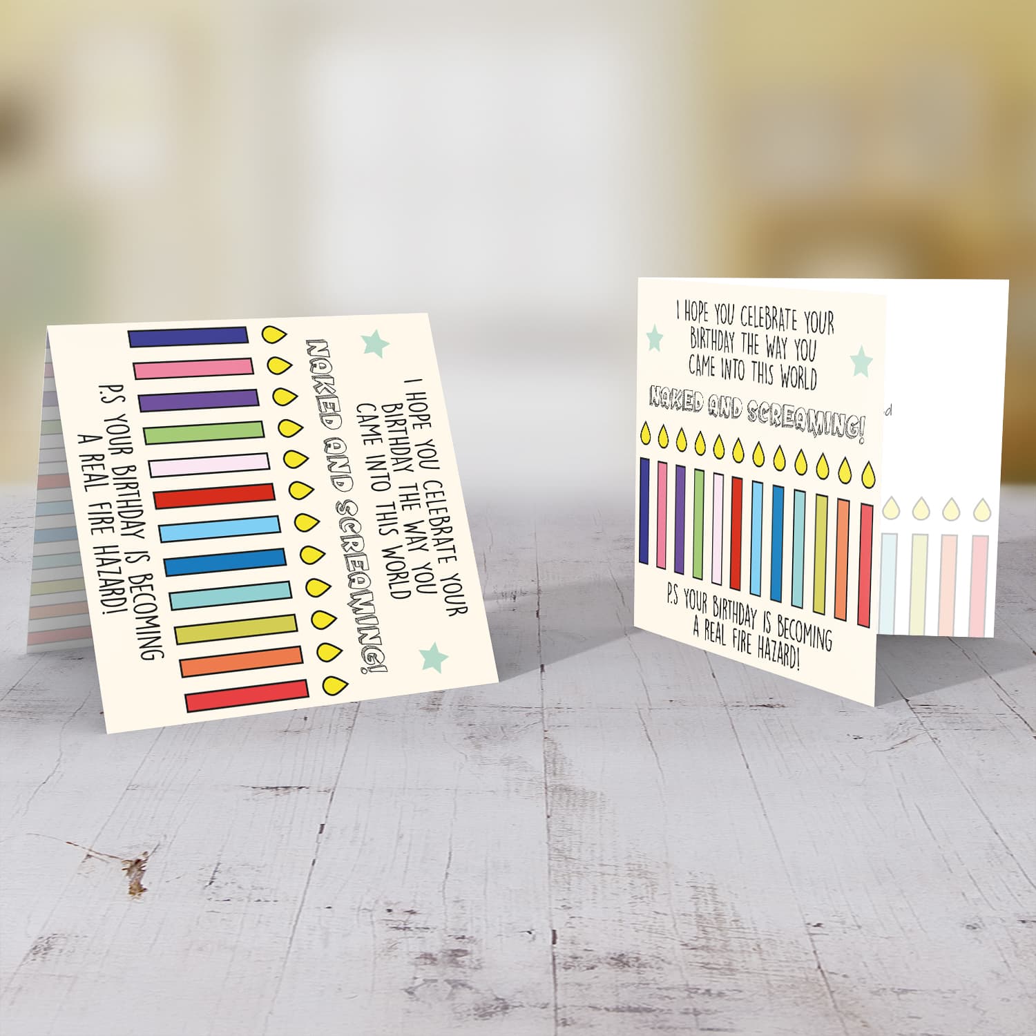 Funny birthday card with a colourful row of candles in English