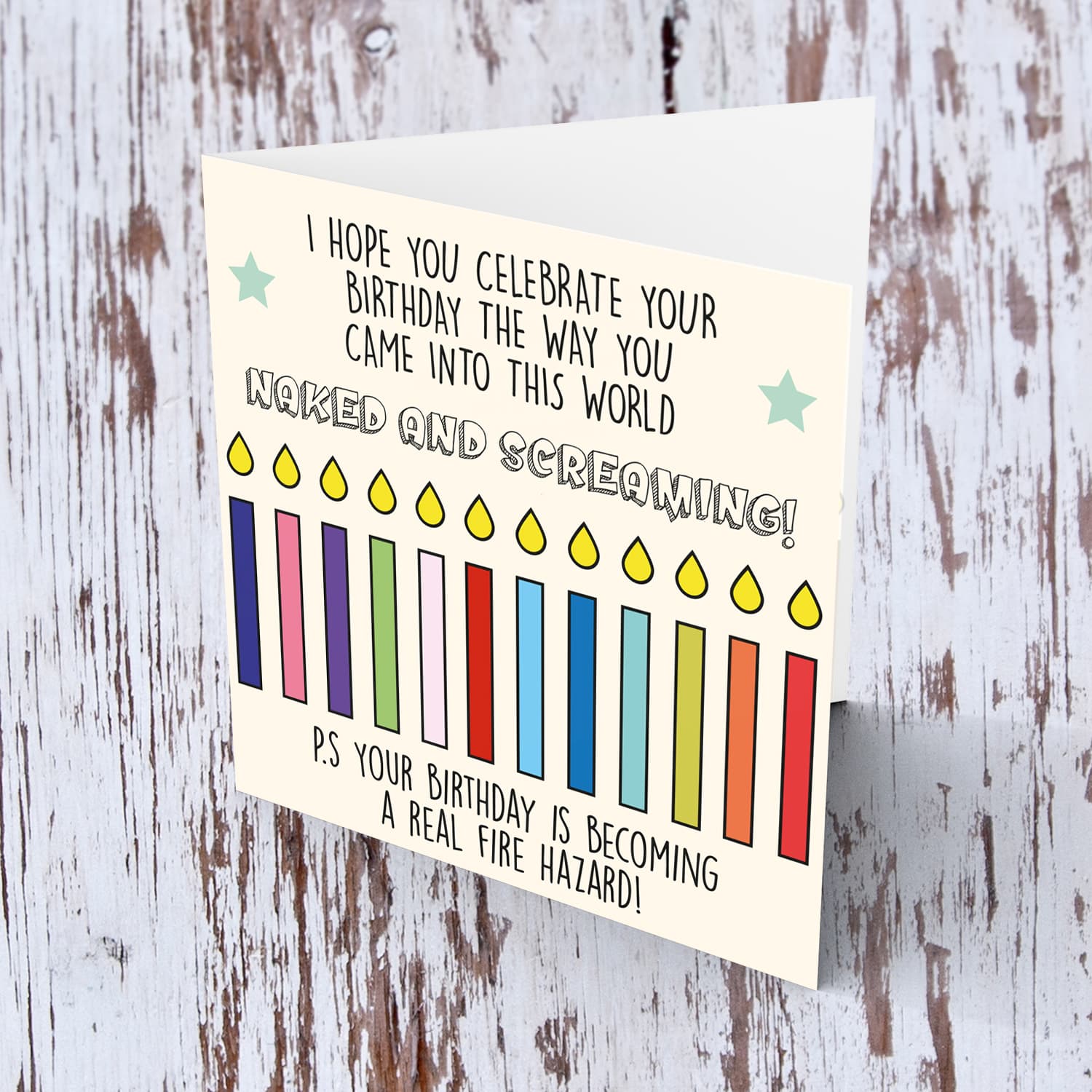 Funny birthday card with a colourful row of candles in English