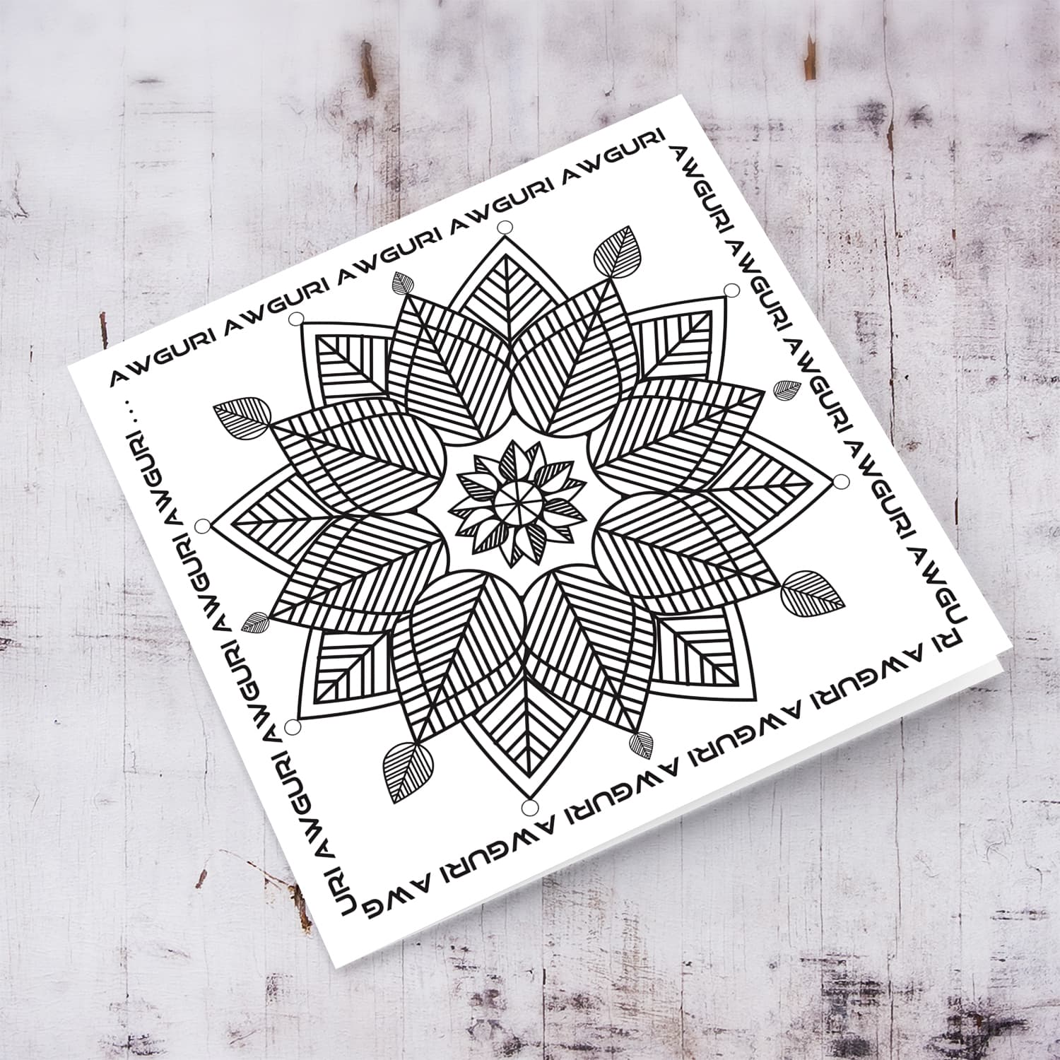 Colouring card with geometric snowflake and repetitive wishes on the border in Maltese