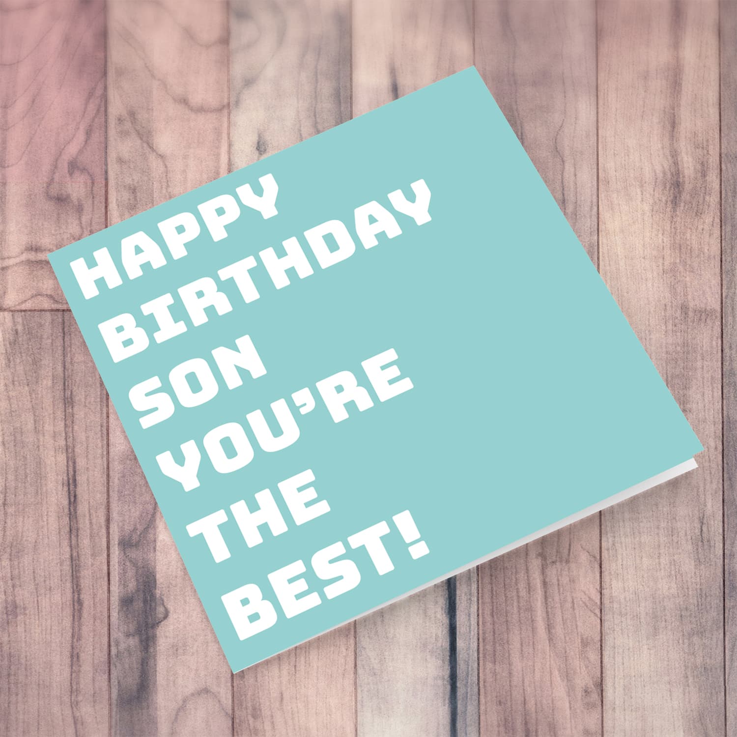 Light turquoise block colour background birthday card for son in English