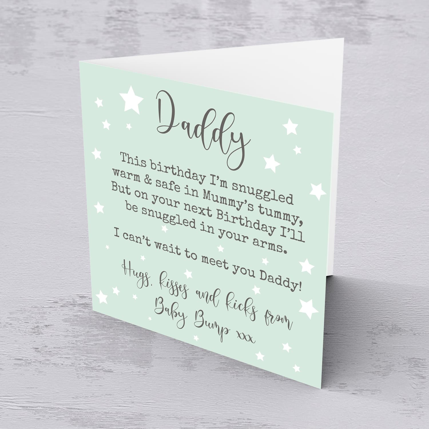 Birthday card for daddy to be with mint background and scattered stars in English