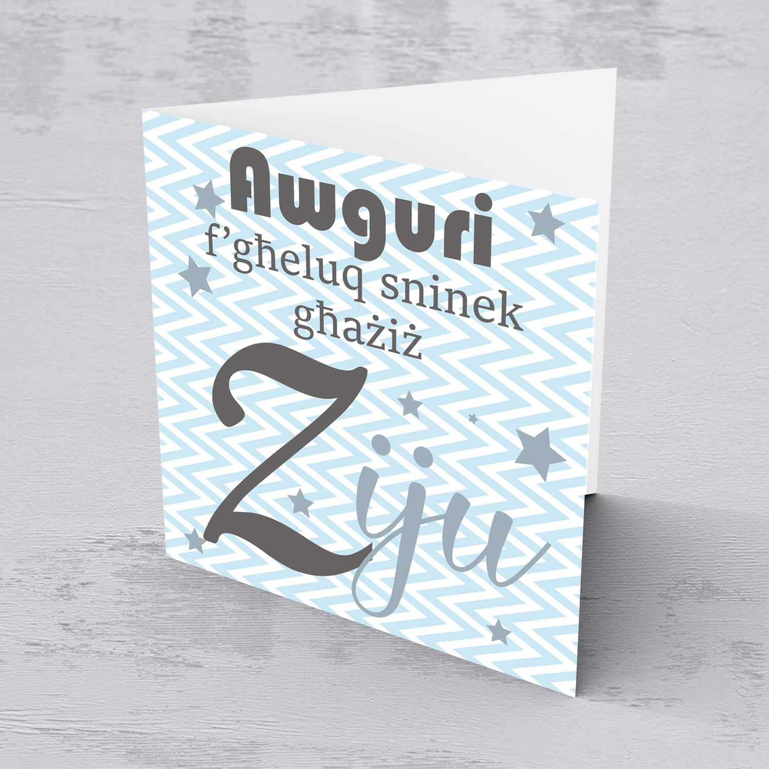 Blue with zigzag background and scattered stars birthday card for Uncle in Maltese