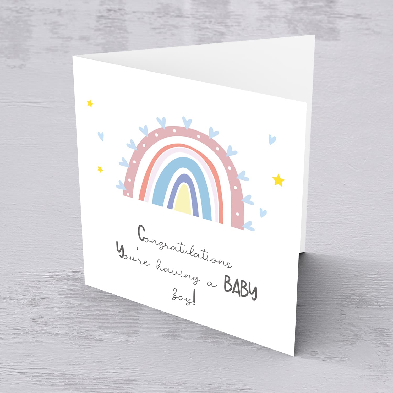 Rainbow themed baby shower card for baby boy in English