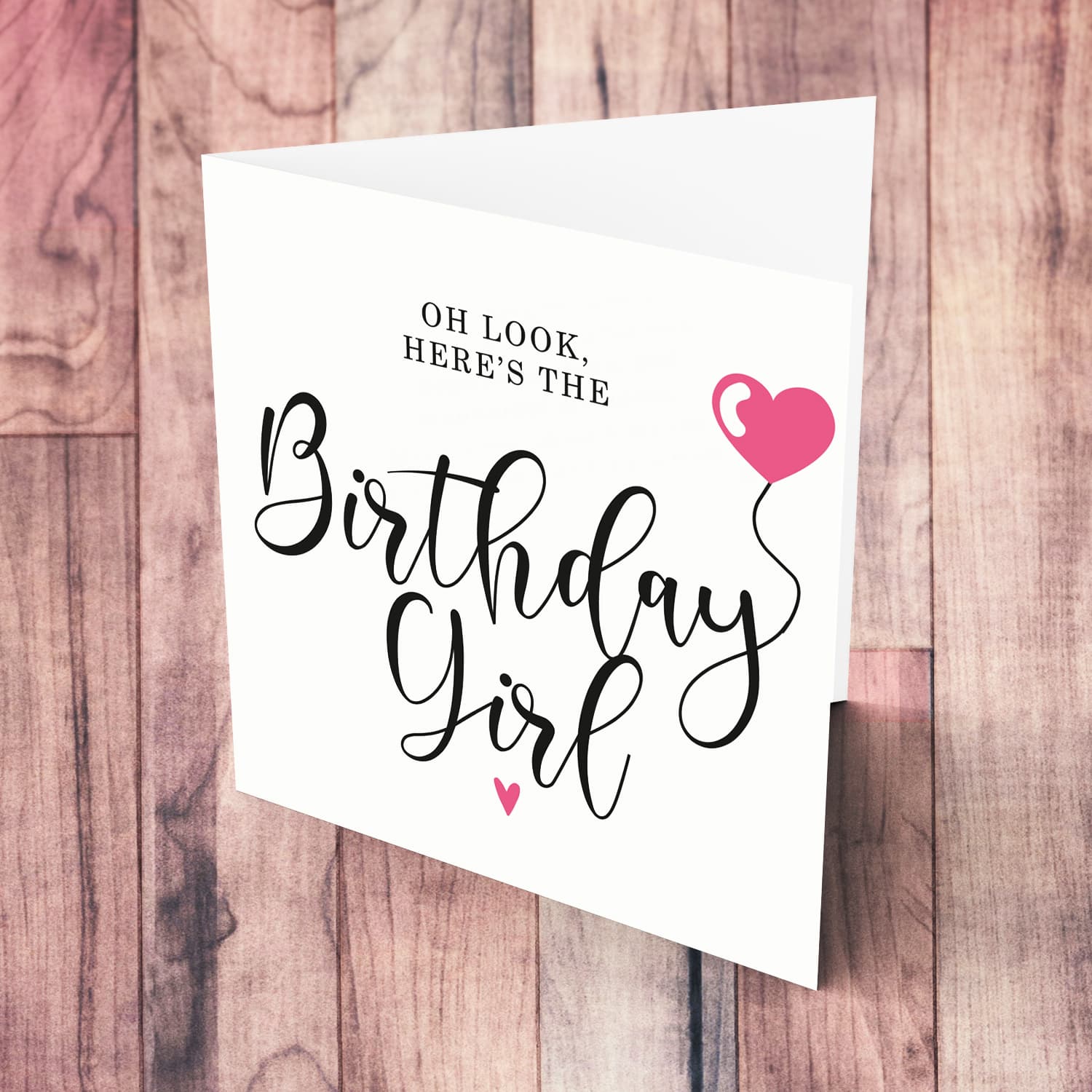 A beautiful minimalst birthday card for the Birthday Girl featuring a pink heart balloon in English