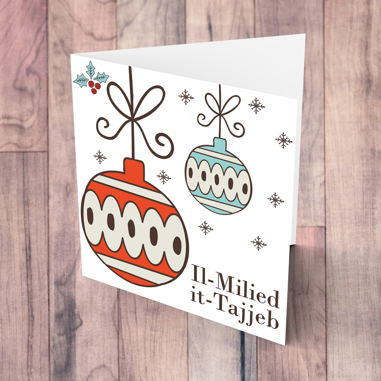 Bauble themed Christmas card in Red and light blue with scattered snowflakes and holly in Maltese