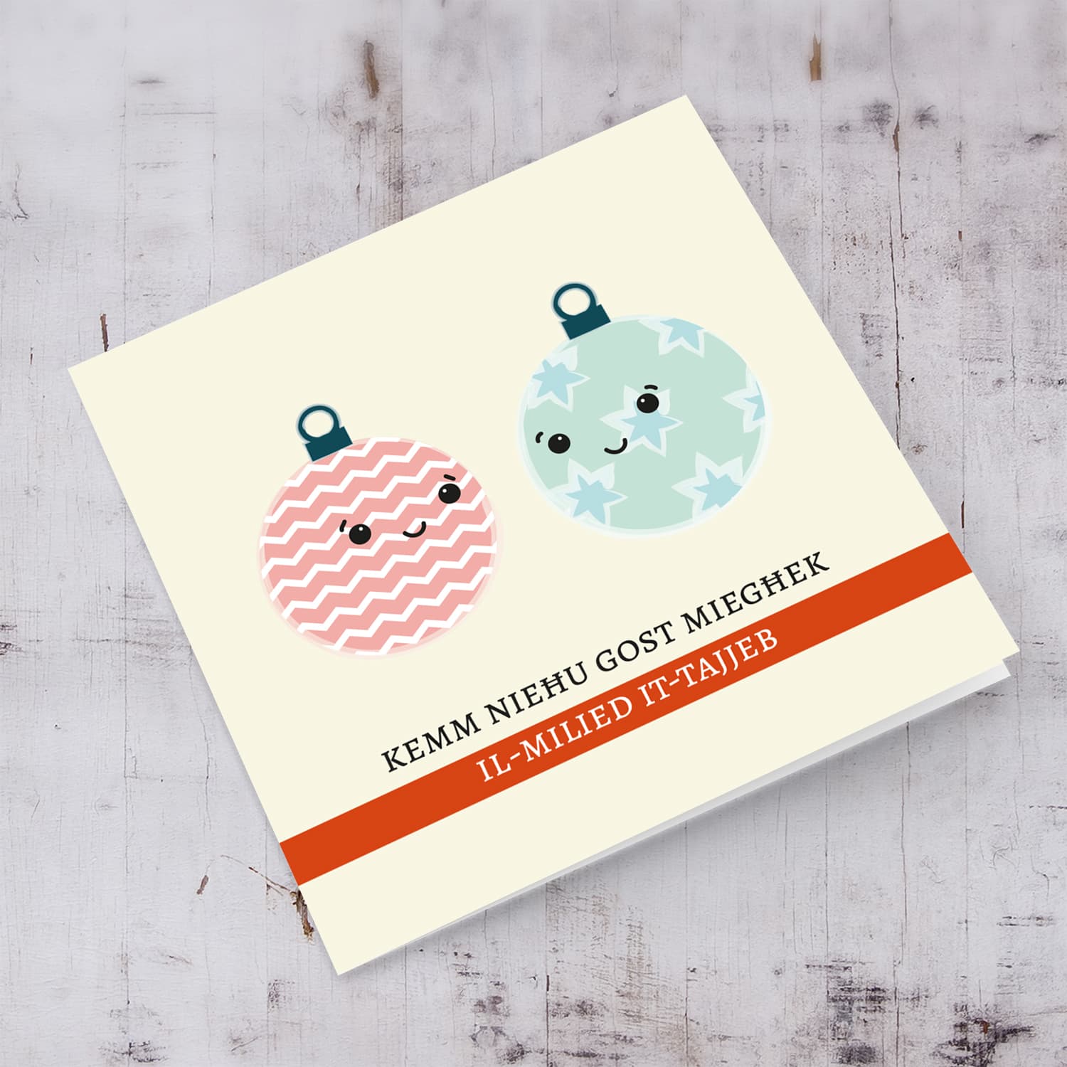 Cute two baubles hanging around Christmas Card in Maltese