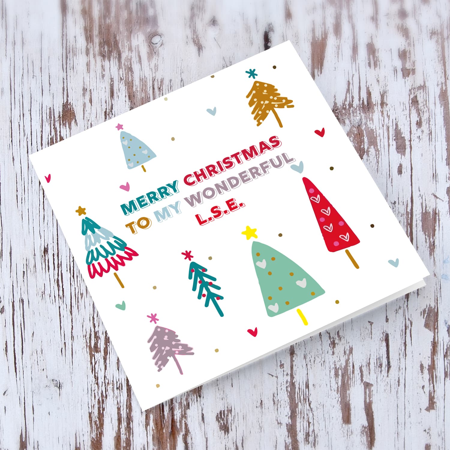 L.S.E. - Colourful christmas trees Christmas card for L.S.E. in English