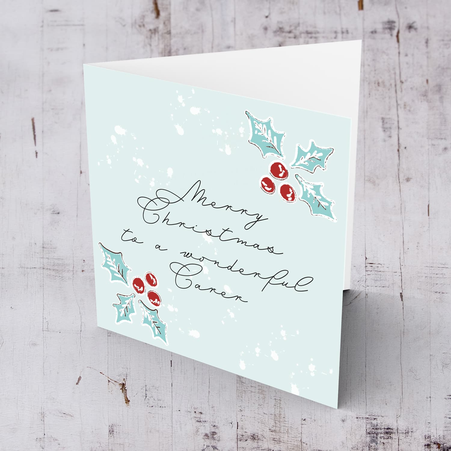 Carer - Christmas holly, scattered snow, and light background Christmas card for a wonderful carer in English