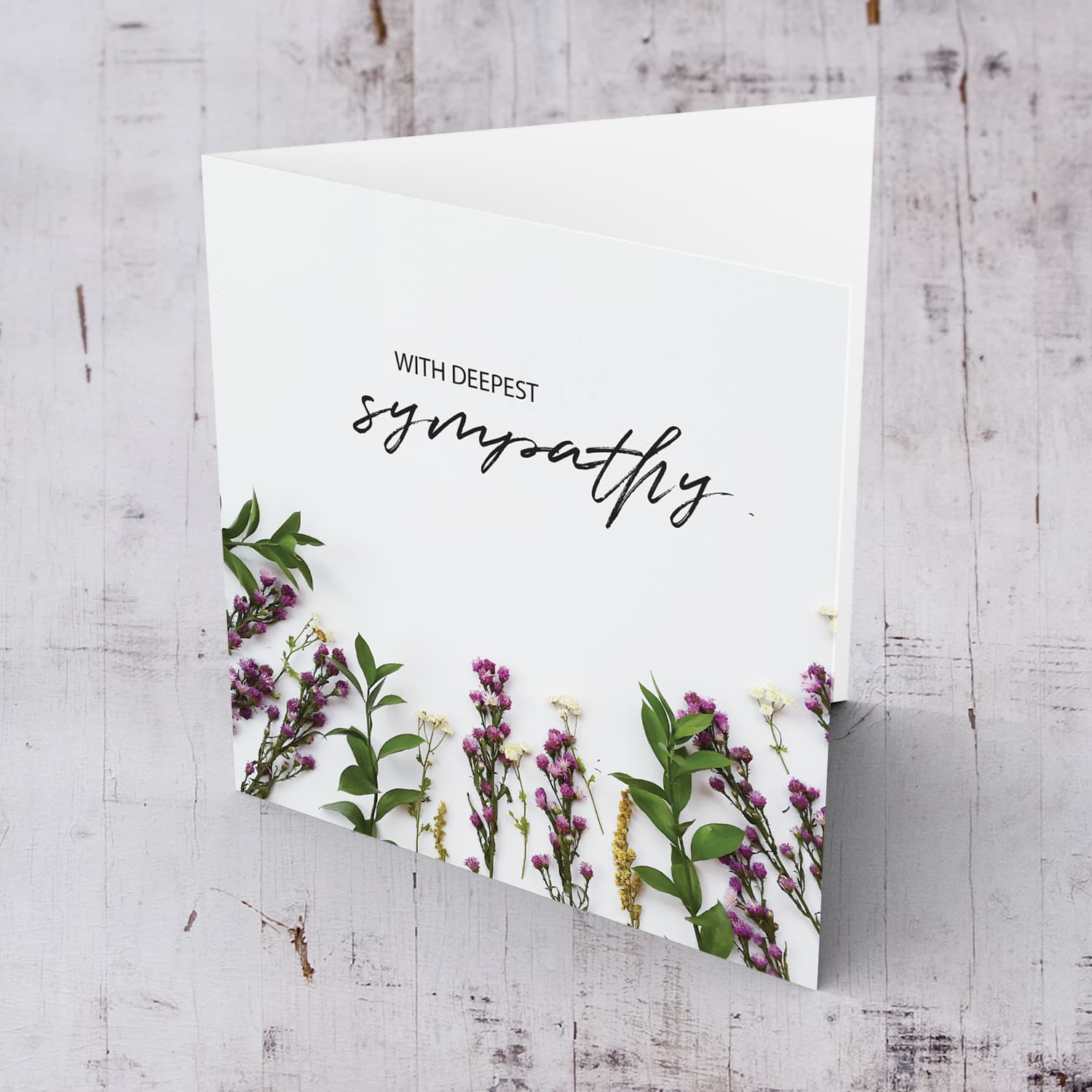Sympathy card with foliage and flowers background in English