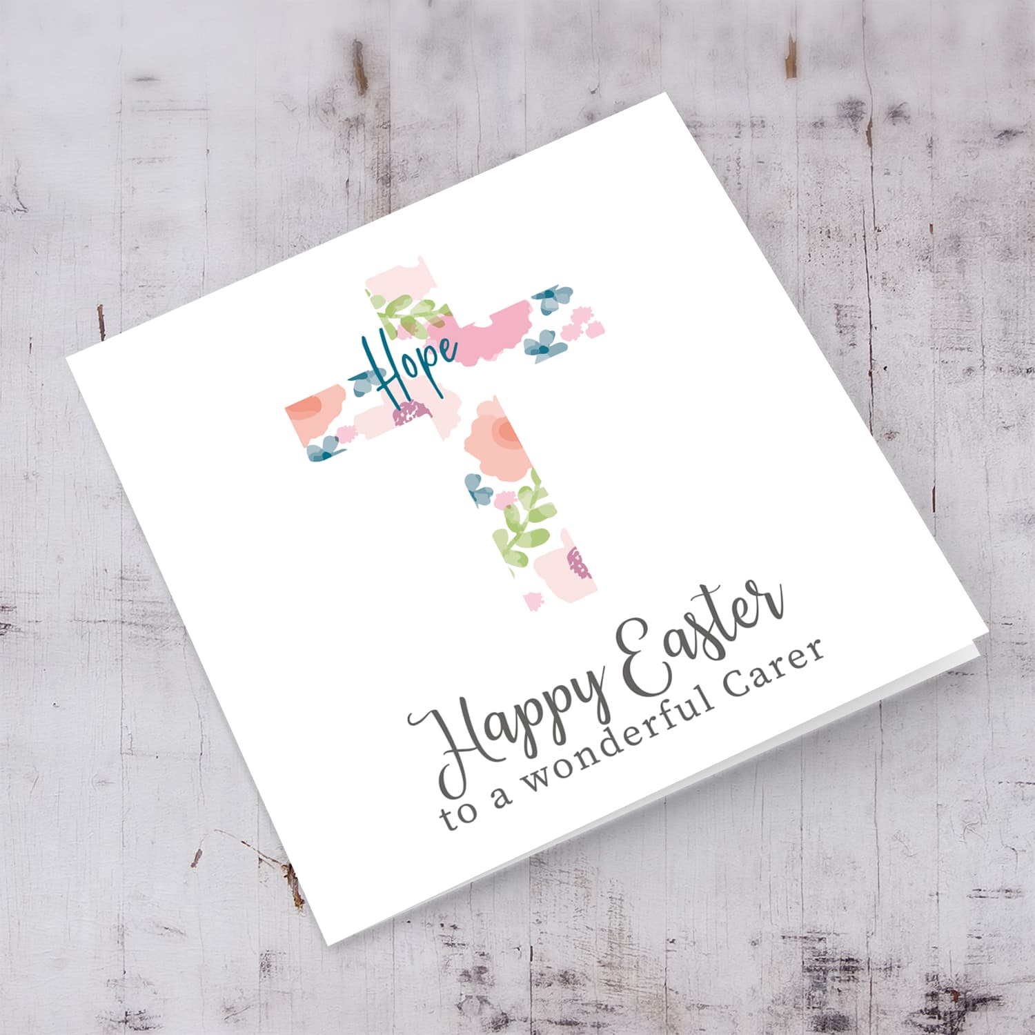 Cross with colourful flowers and hope Easter card for a wonderful carer in English