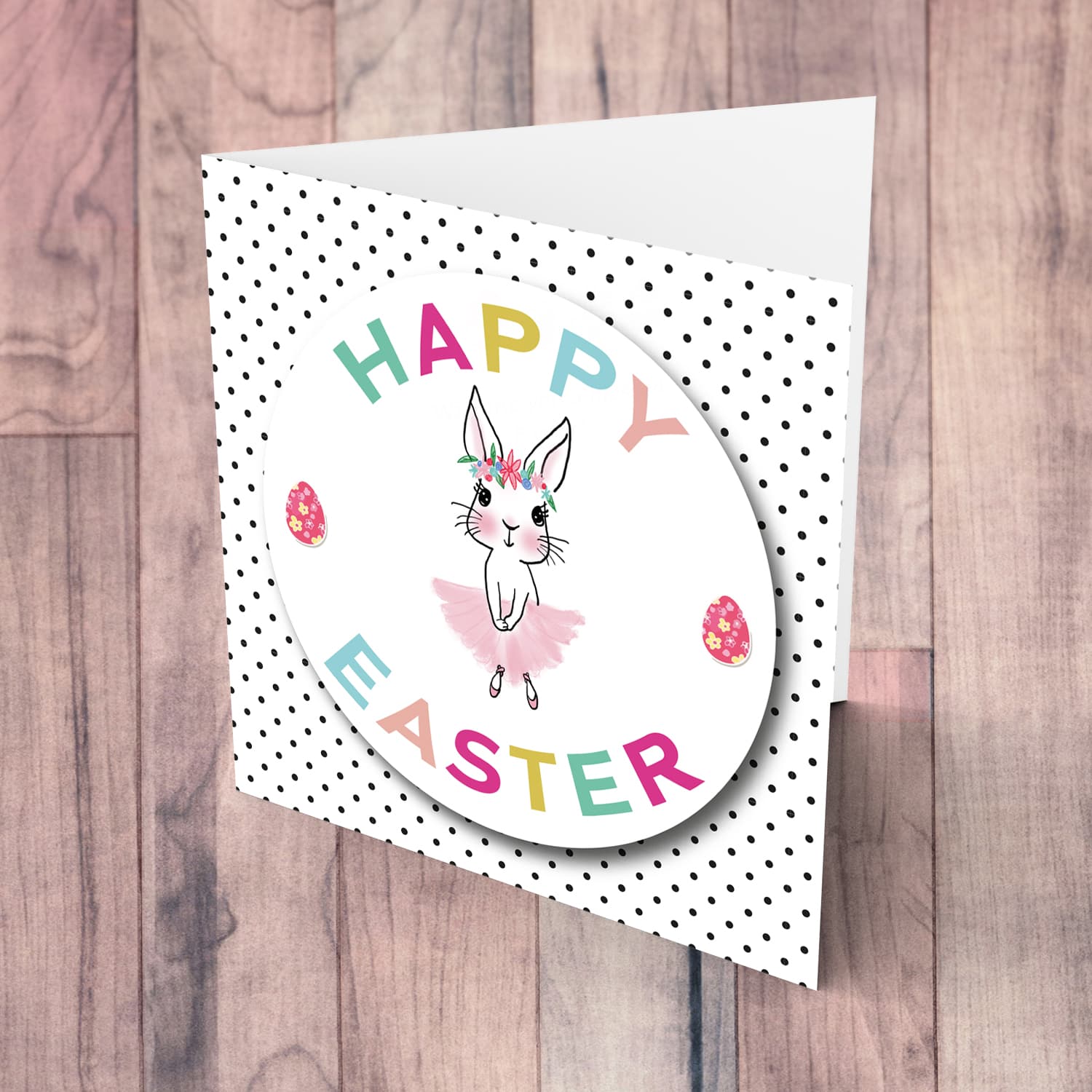Cute bunny Easter card with colourful text and polka dotted background in English