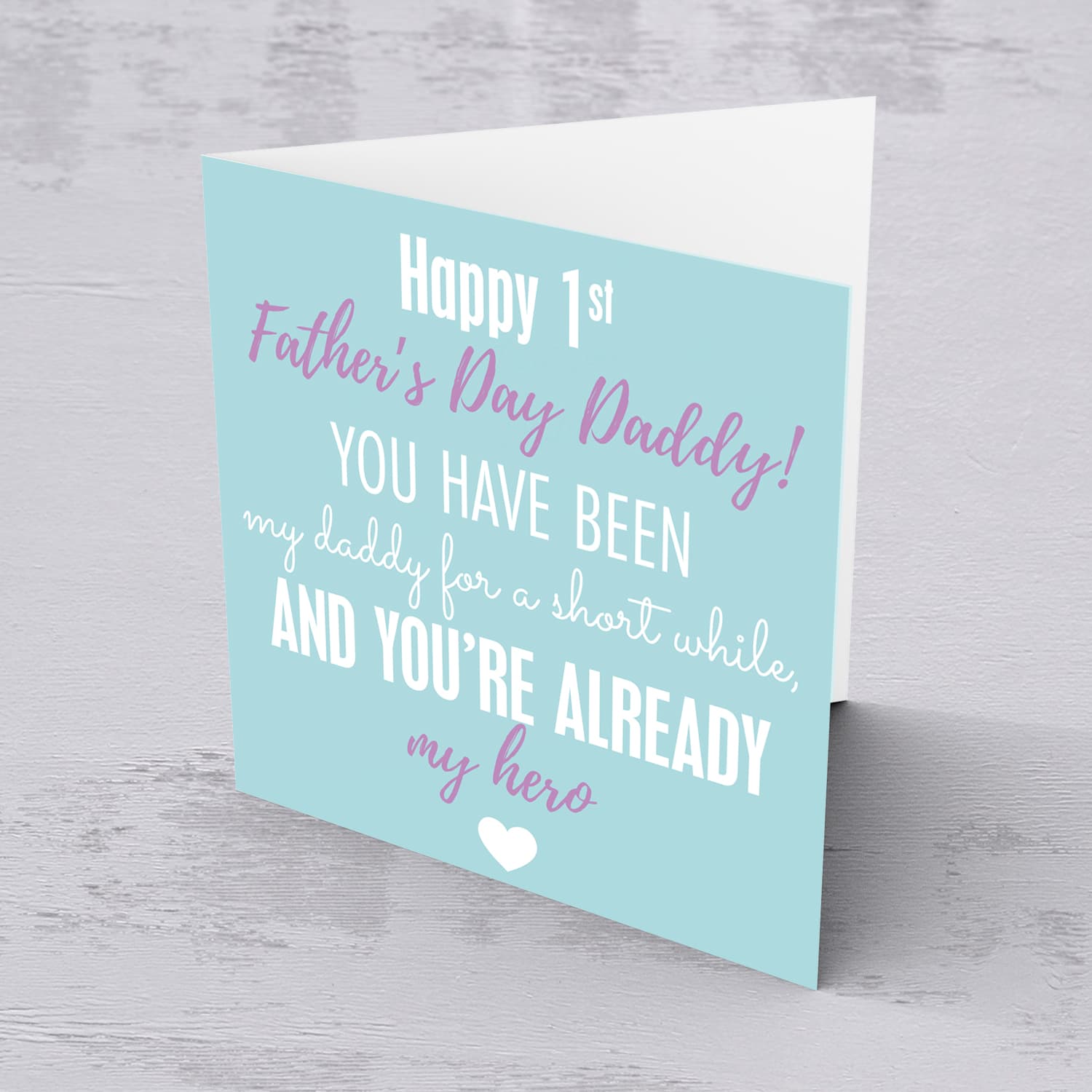 First Father's Day card in pastel green background and purple and white wording.