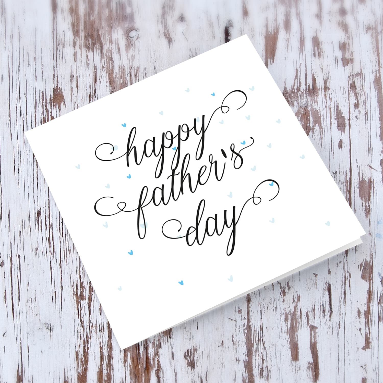 Cute father's day card with blue scattered hearts in English