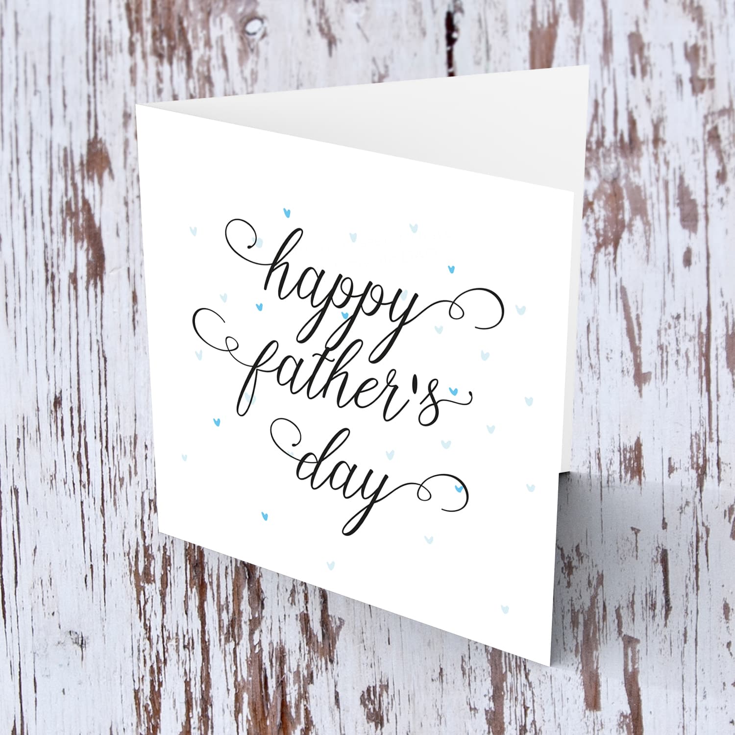 Cute father's day card with blue scattered hearts in English