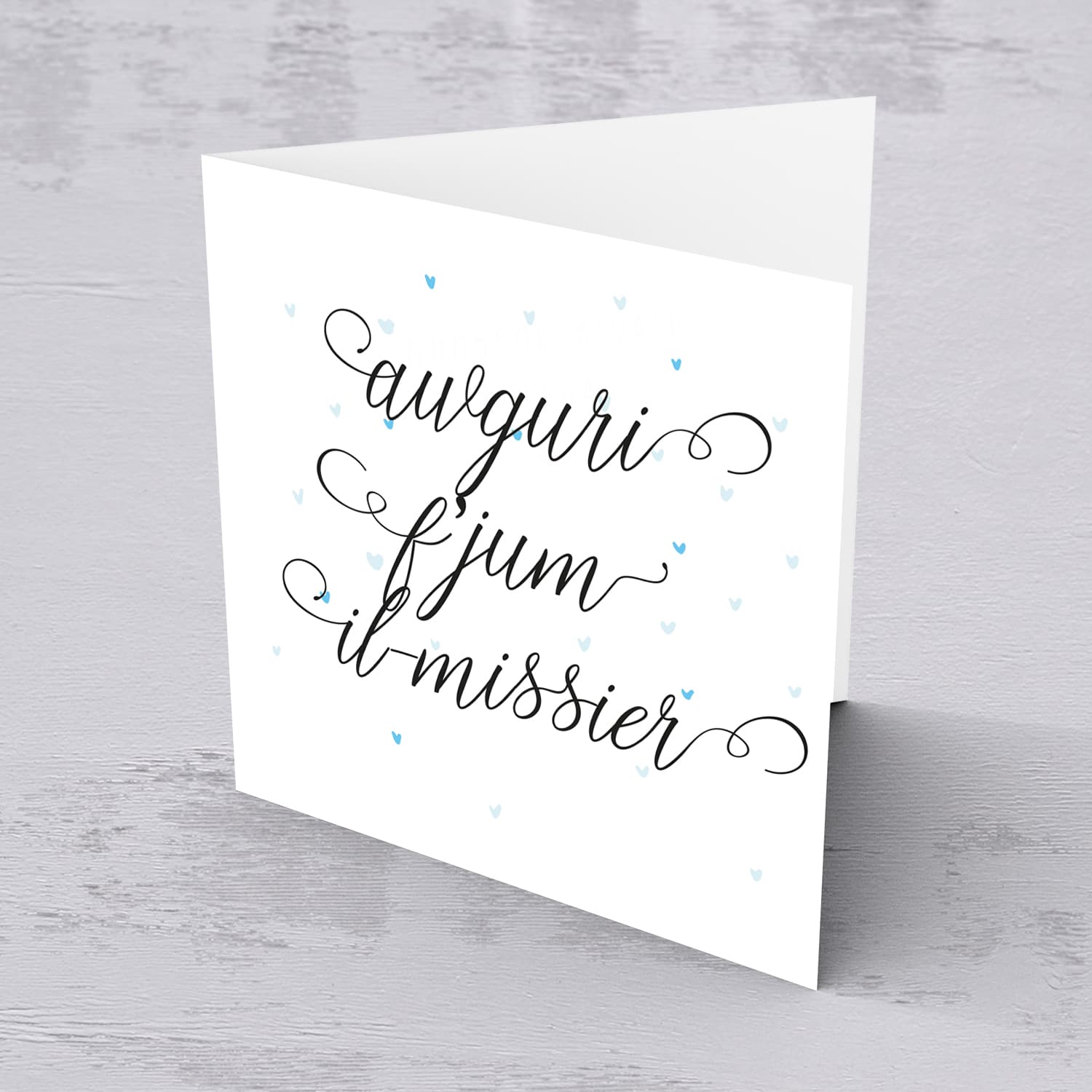 Cute father's day card with blue scattered hearts in Maltese