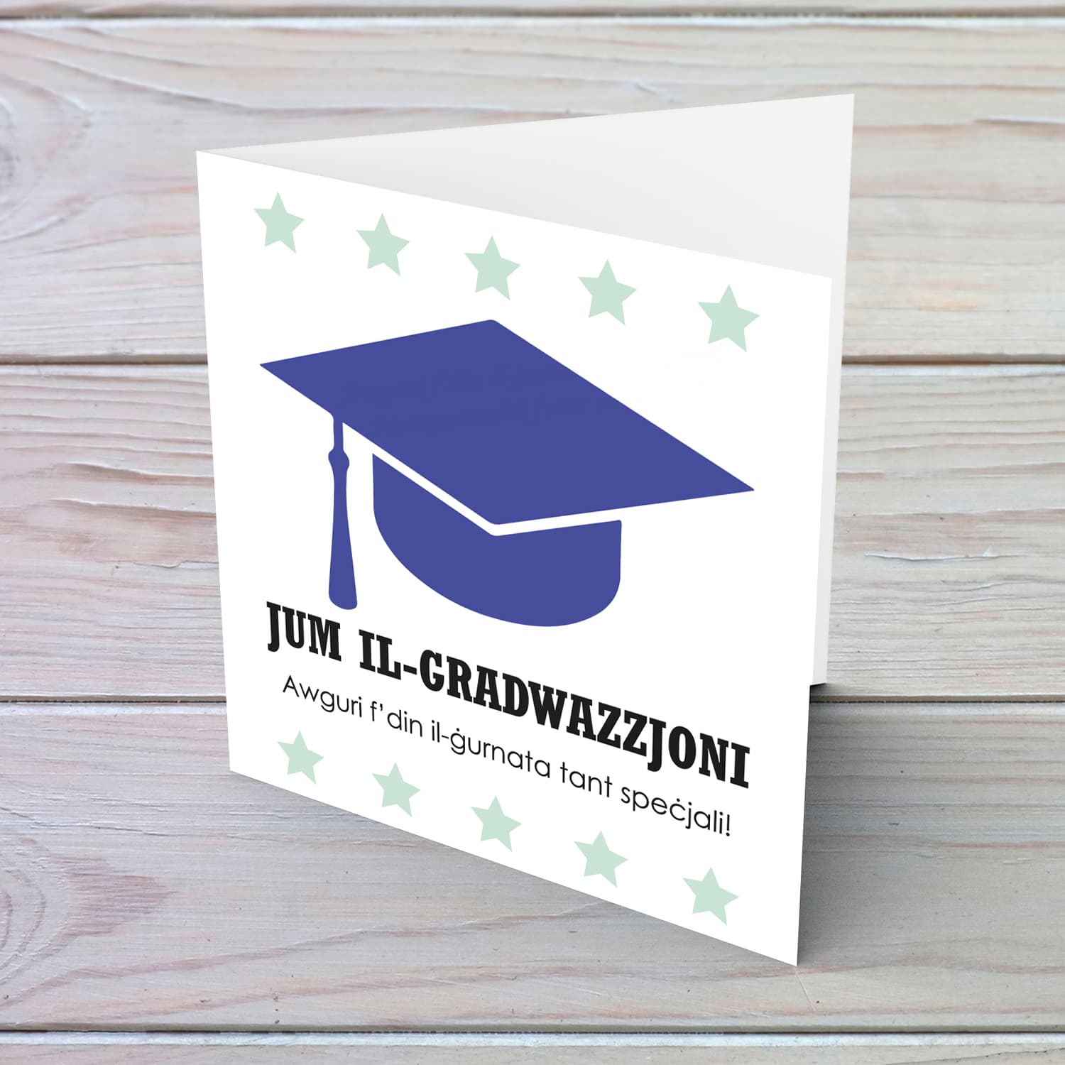 Blue graduation hat card with green stars in Maltese