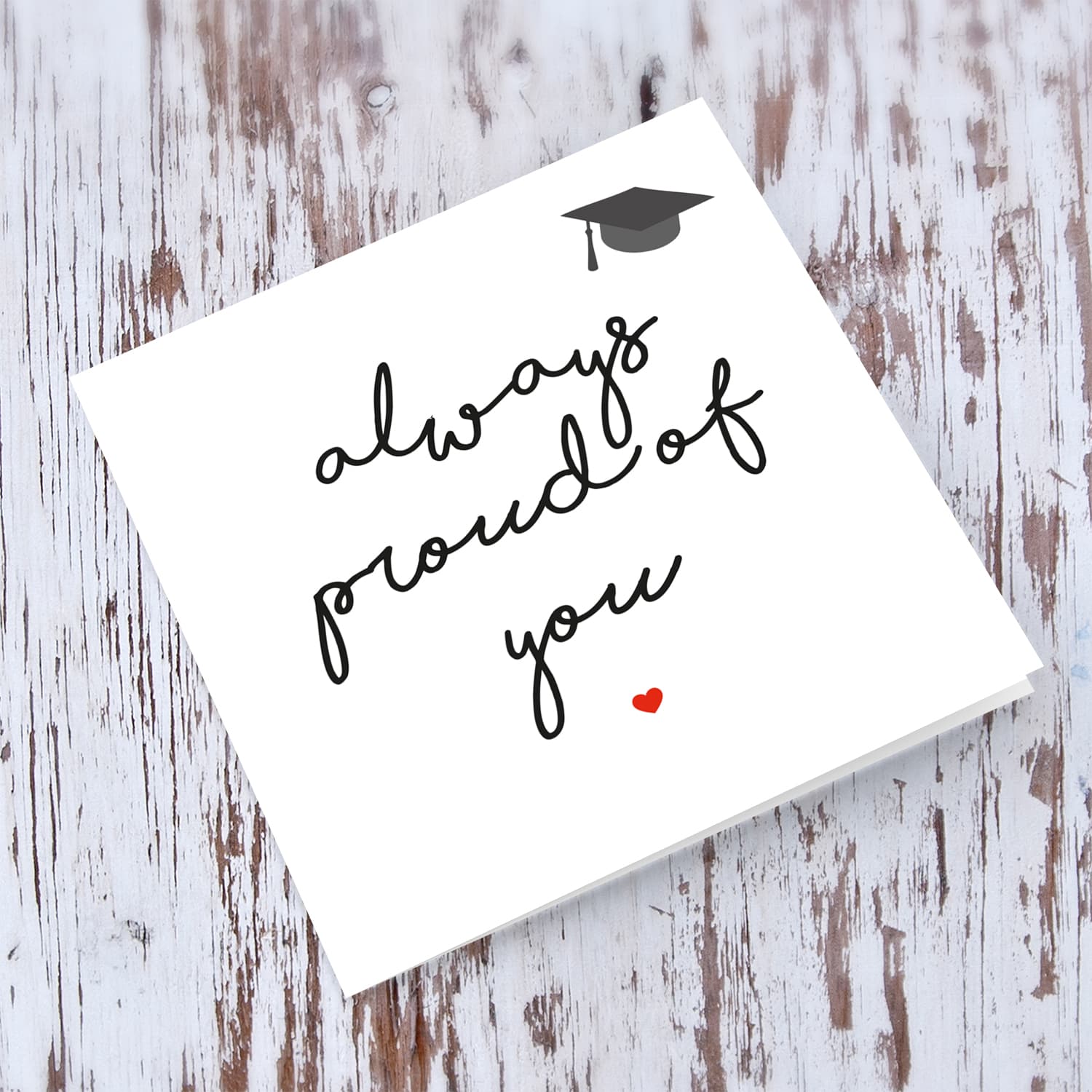 Minimalist Graduation Card with small graduation hat and red heart in English (unisex)