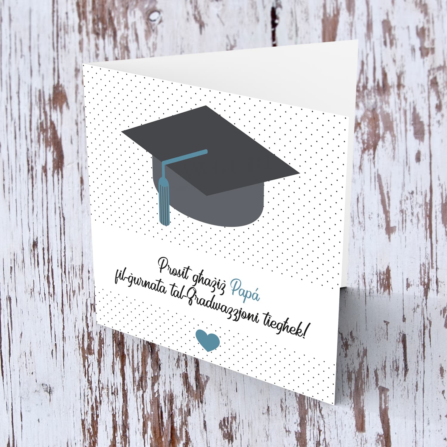 Dad Graduation card with dotted background, graduation hat and blue heart in Maltese