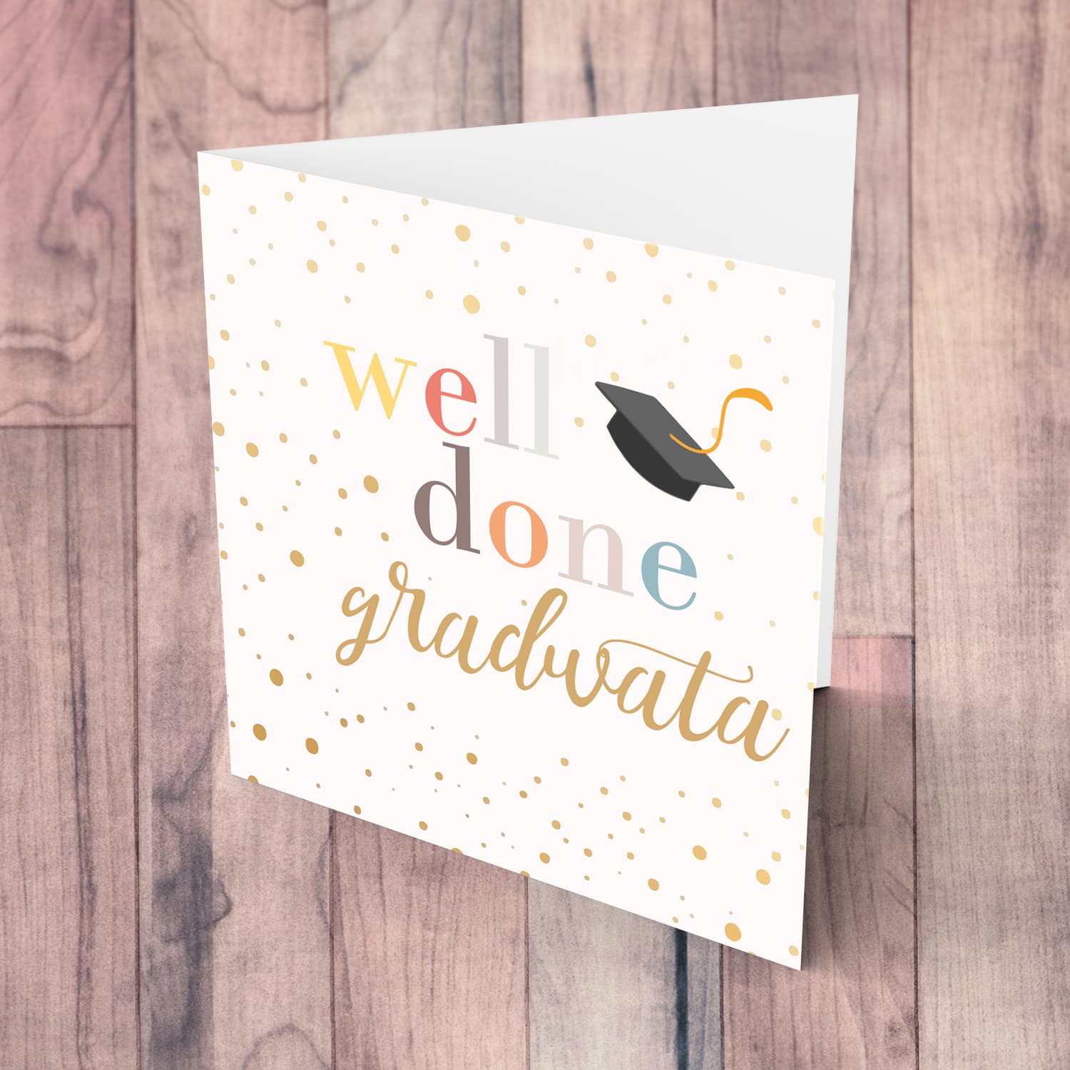 Well Done card - gradwata with colourful text, graduation hat and scattered spots in English & Maltese