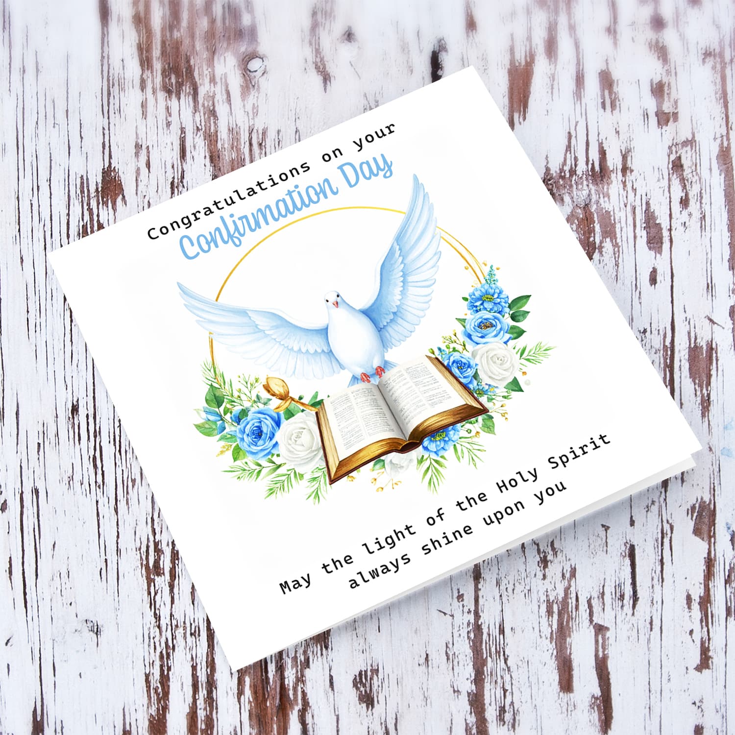 An open elegant Confirmation card for Boys featuring the Holy Spirit dove, an open Bible and beautiful blue and white flowers in English