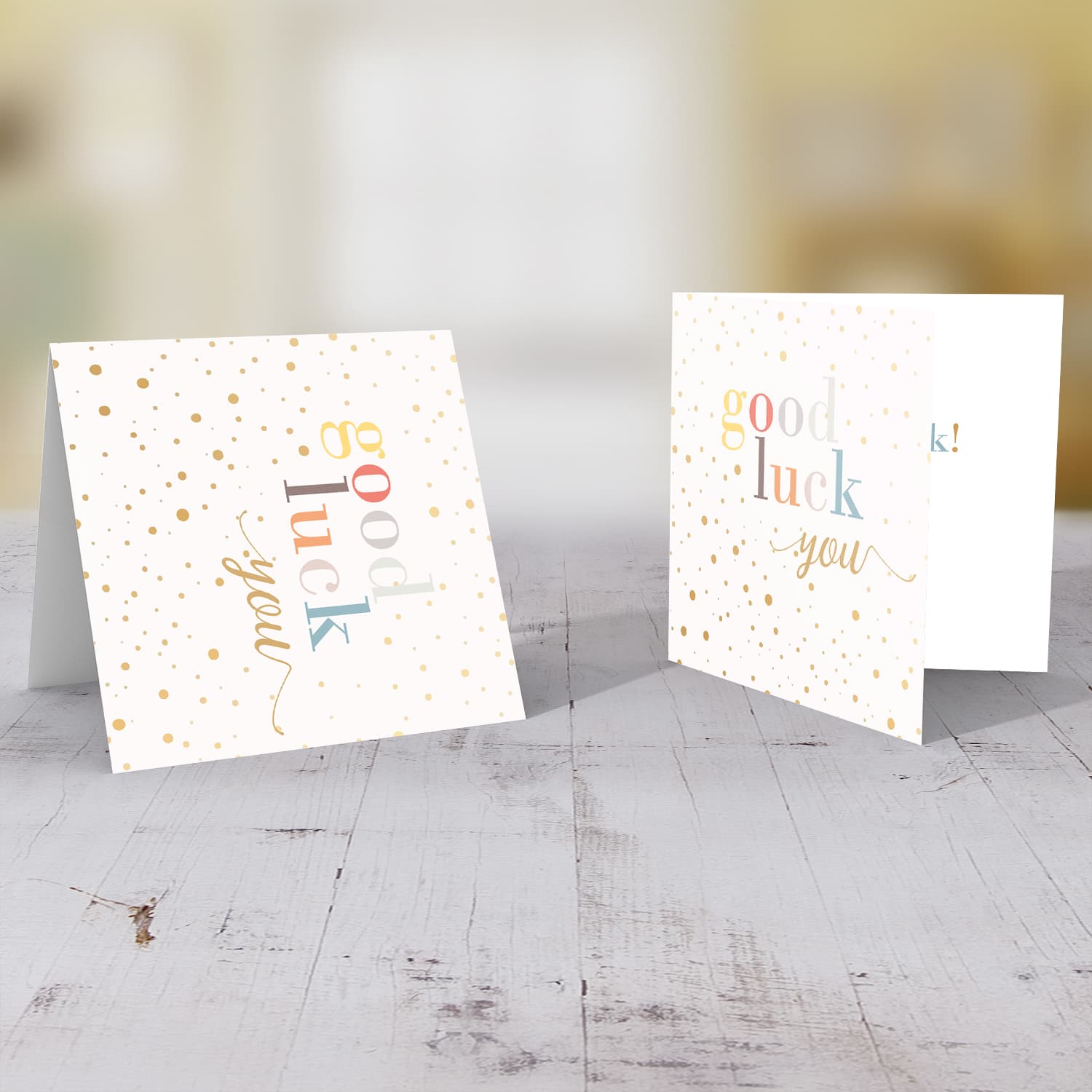 Good luck you greeting card with scattered dots and colourful text in English