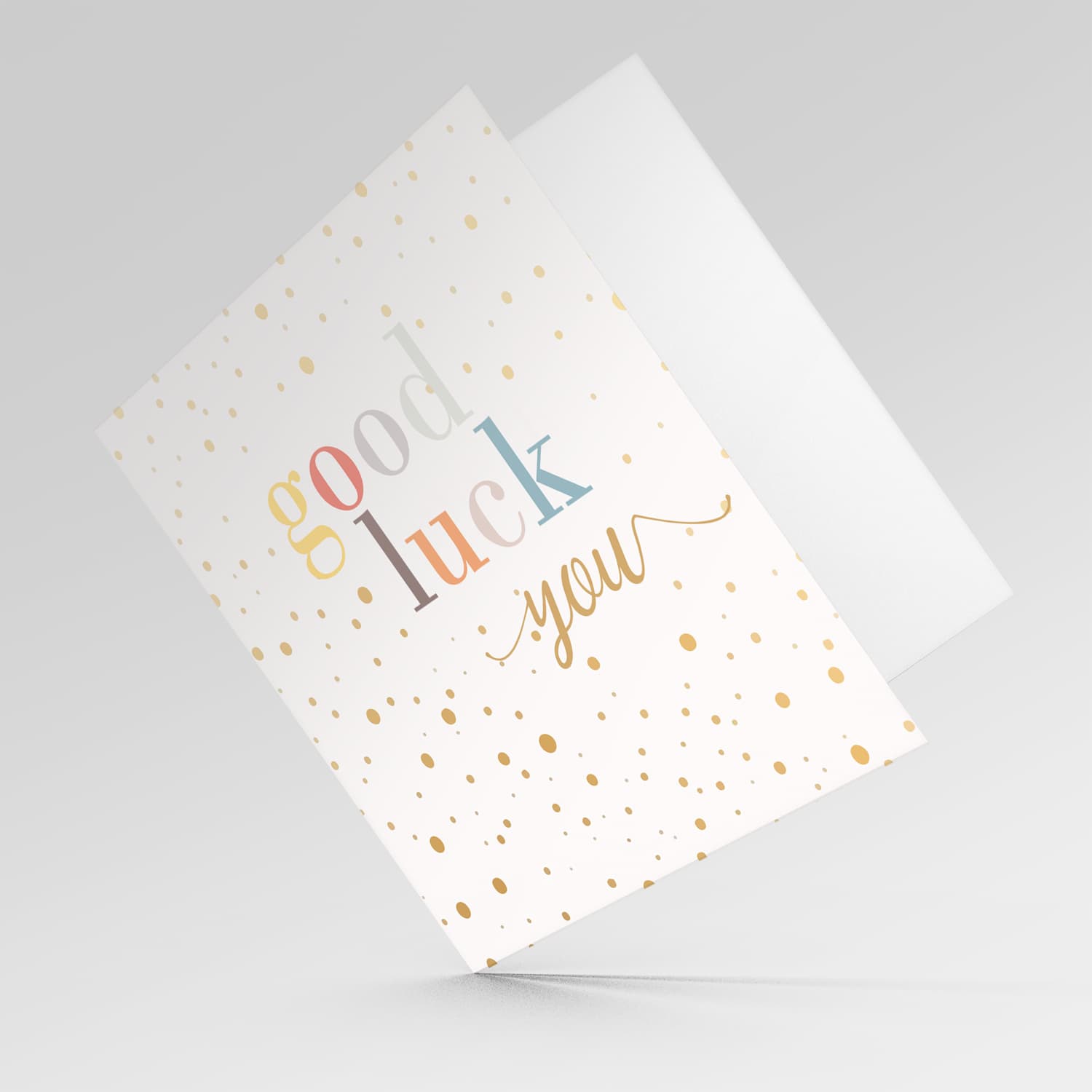 Good luck you greeting card with scattered dots and colourful text in English