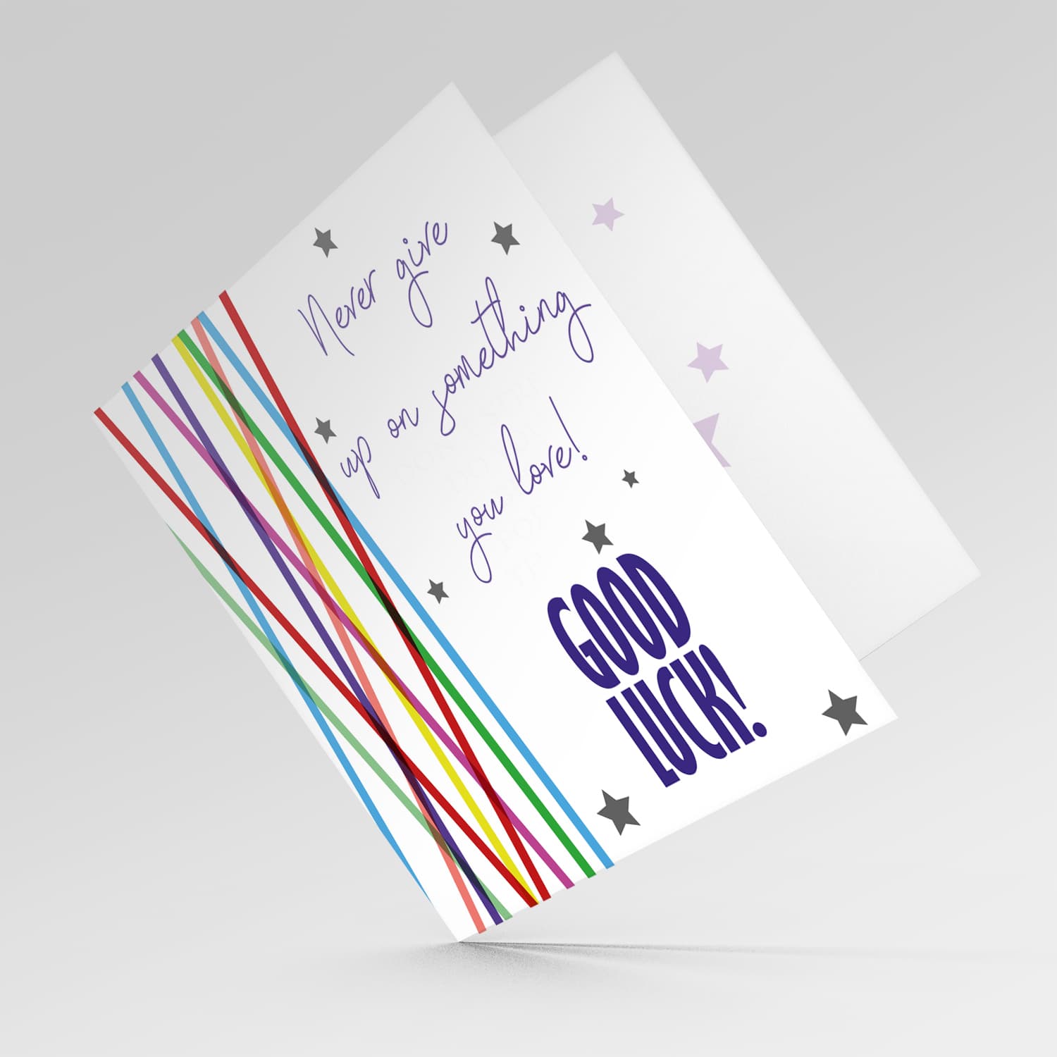 Colourful lines and scattered hearts - never give up good luck card in English