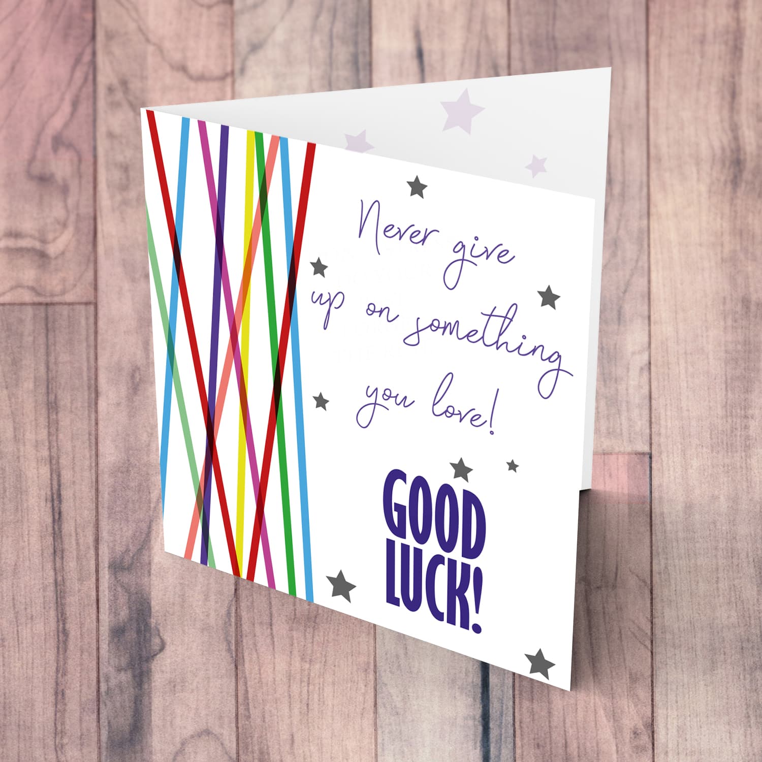 Colourful lines and scattered hearts - never give up good luck card in English