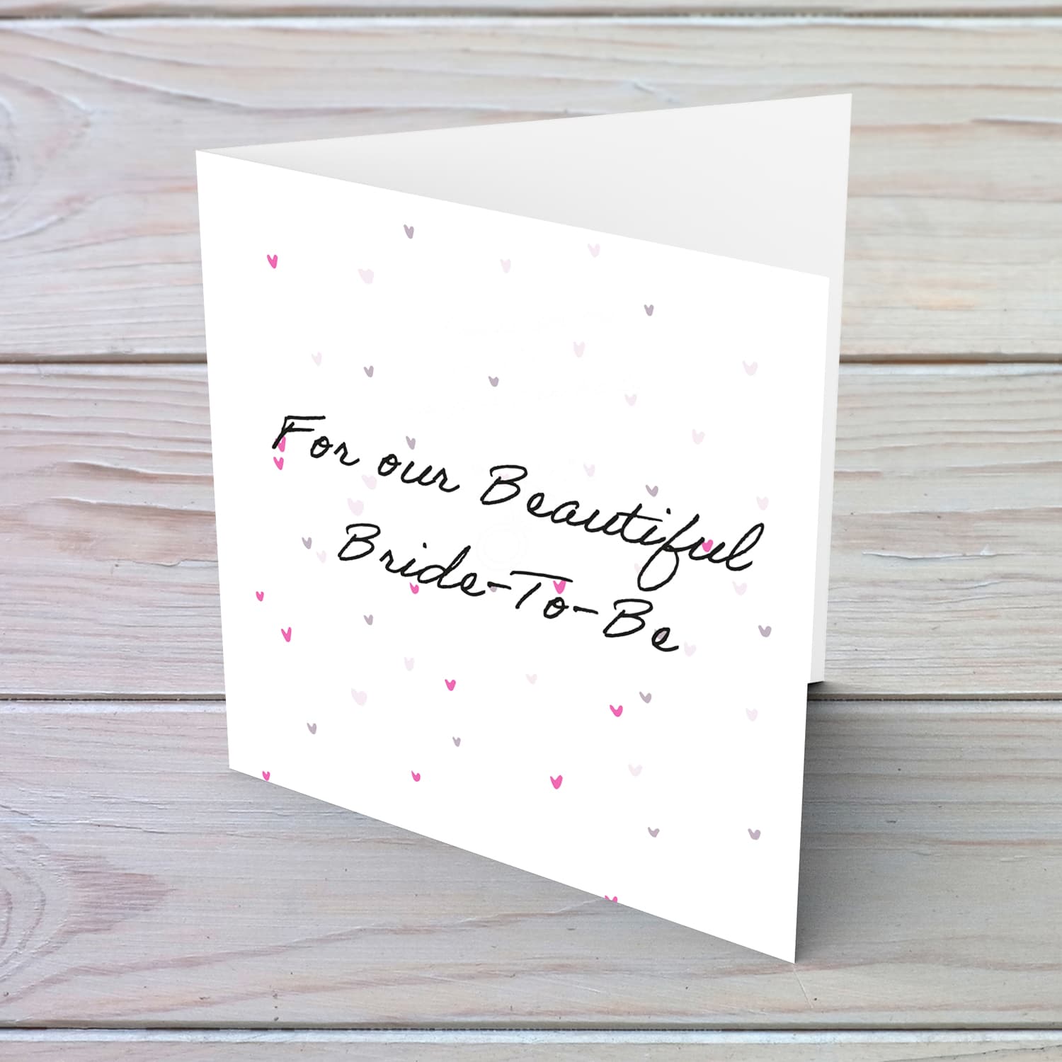 Cute and petite Hen party card for the beautiful bride to be with scattered hearts in English