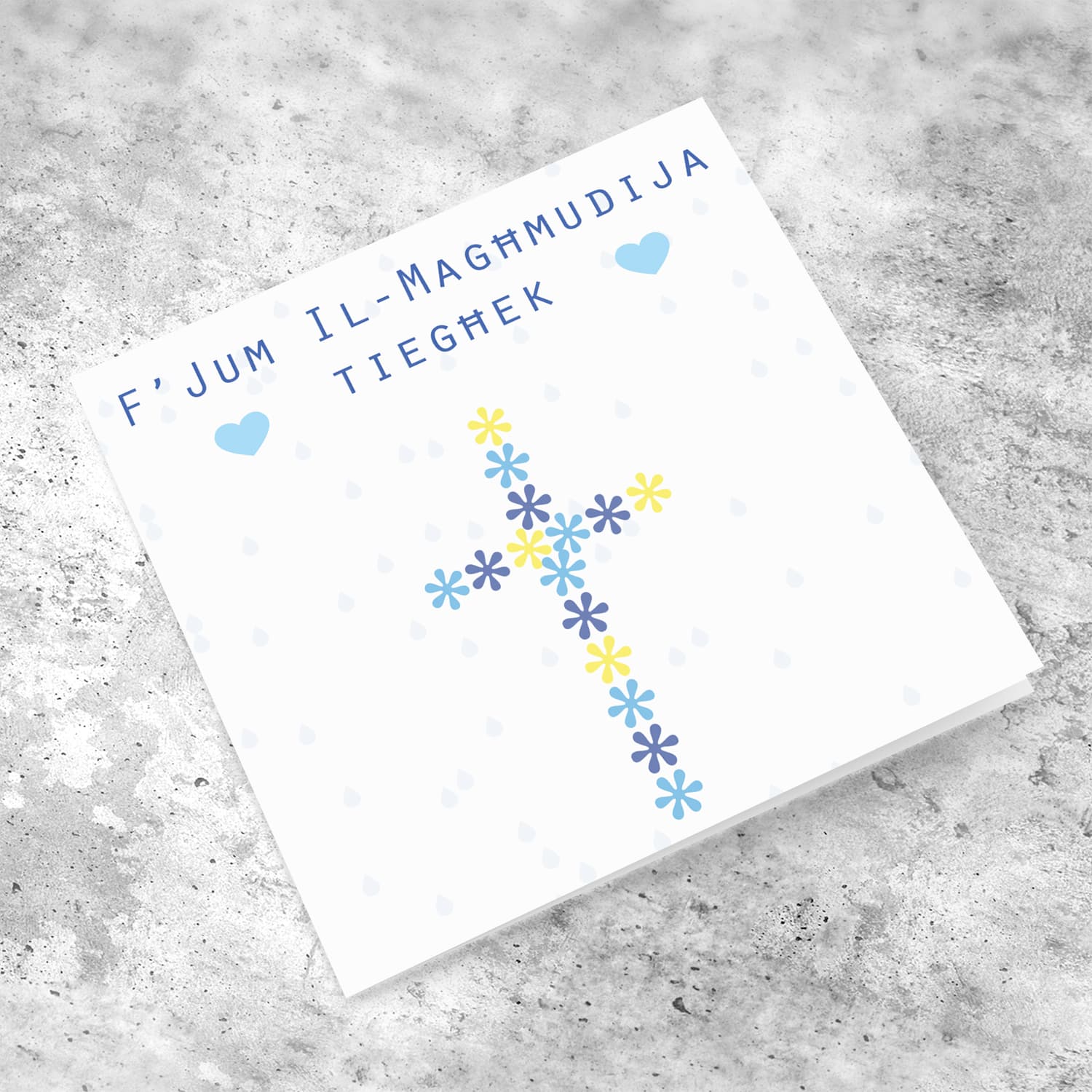 Floral cross in shades of blue and yellow baptism card in Maltese
