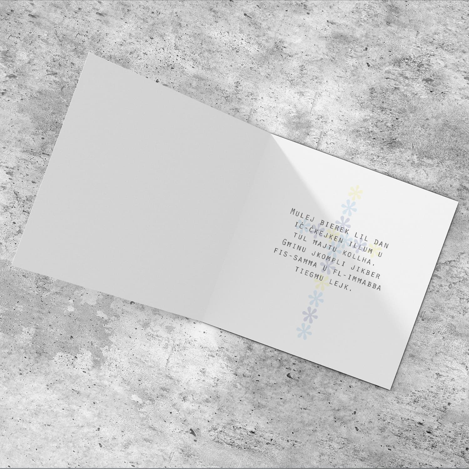 Floral cross in shades of blue and yellow baptism card in Maltese