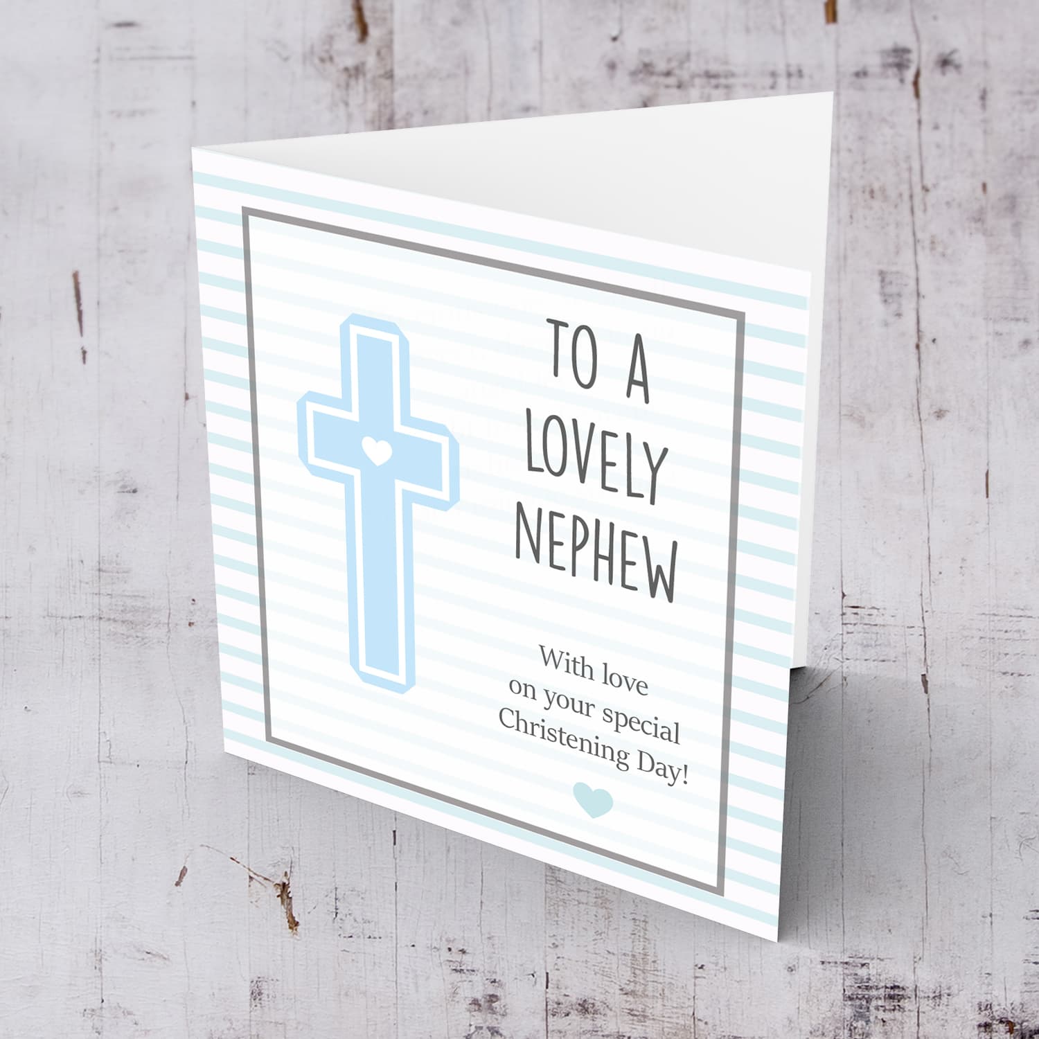 Baptism card with light blue cross with striped background for nephew in English