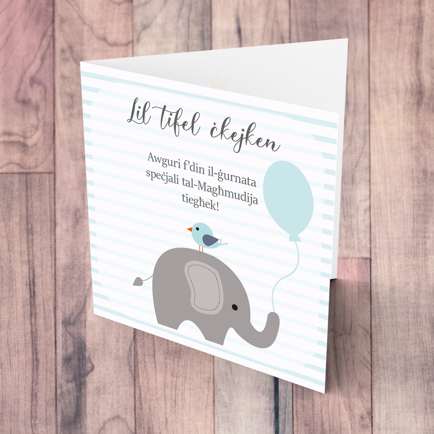 Elephant with bird holding blue baloon, with striped background baptism card in Maltese